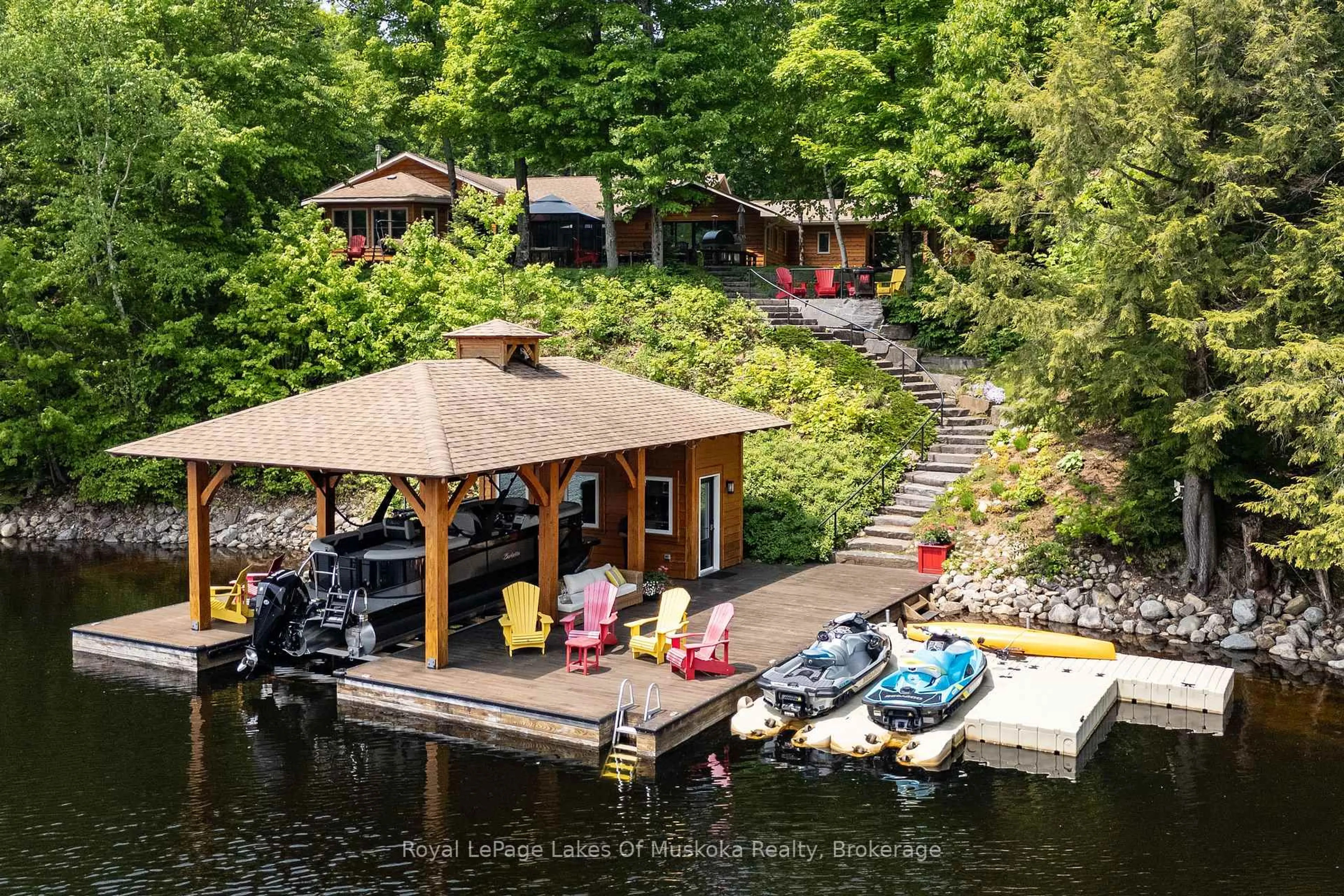 A pic from outside/outdoor area/front of a property/back of a property/a pic from drone, water/lake/river/ocean view for 1319 Wolf Circ, Algonquin Highlands Ontario P0A 1E0