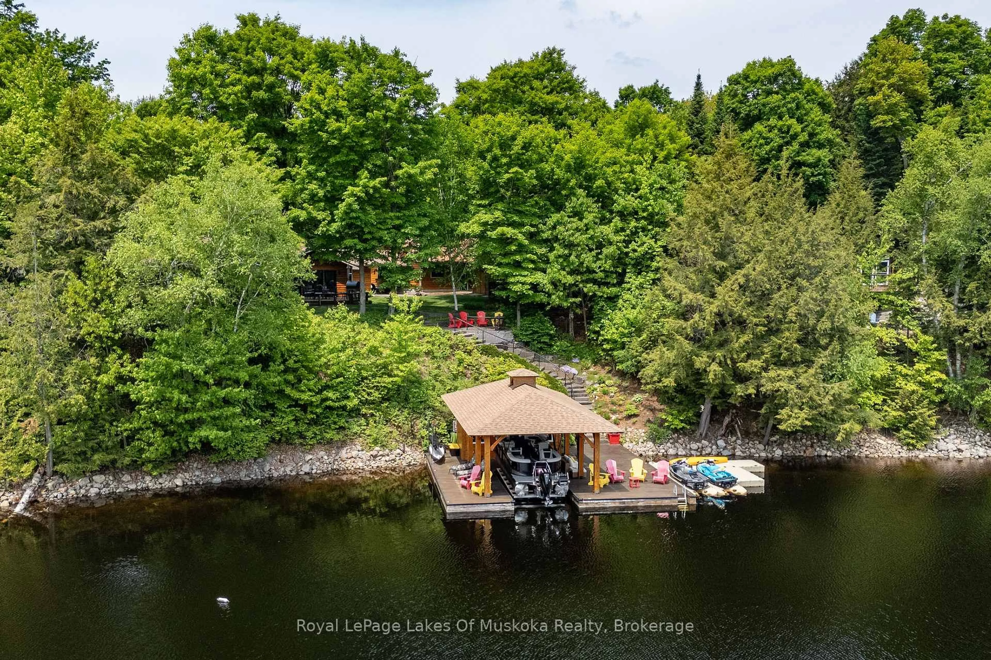 A pic from outside/outdoor area/front of a property/back of a property/a pic from drone, water/lake/river/ocean view for 1319 Wolf Circ, Algonquin Highlands Ontario P0A 1E0