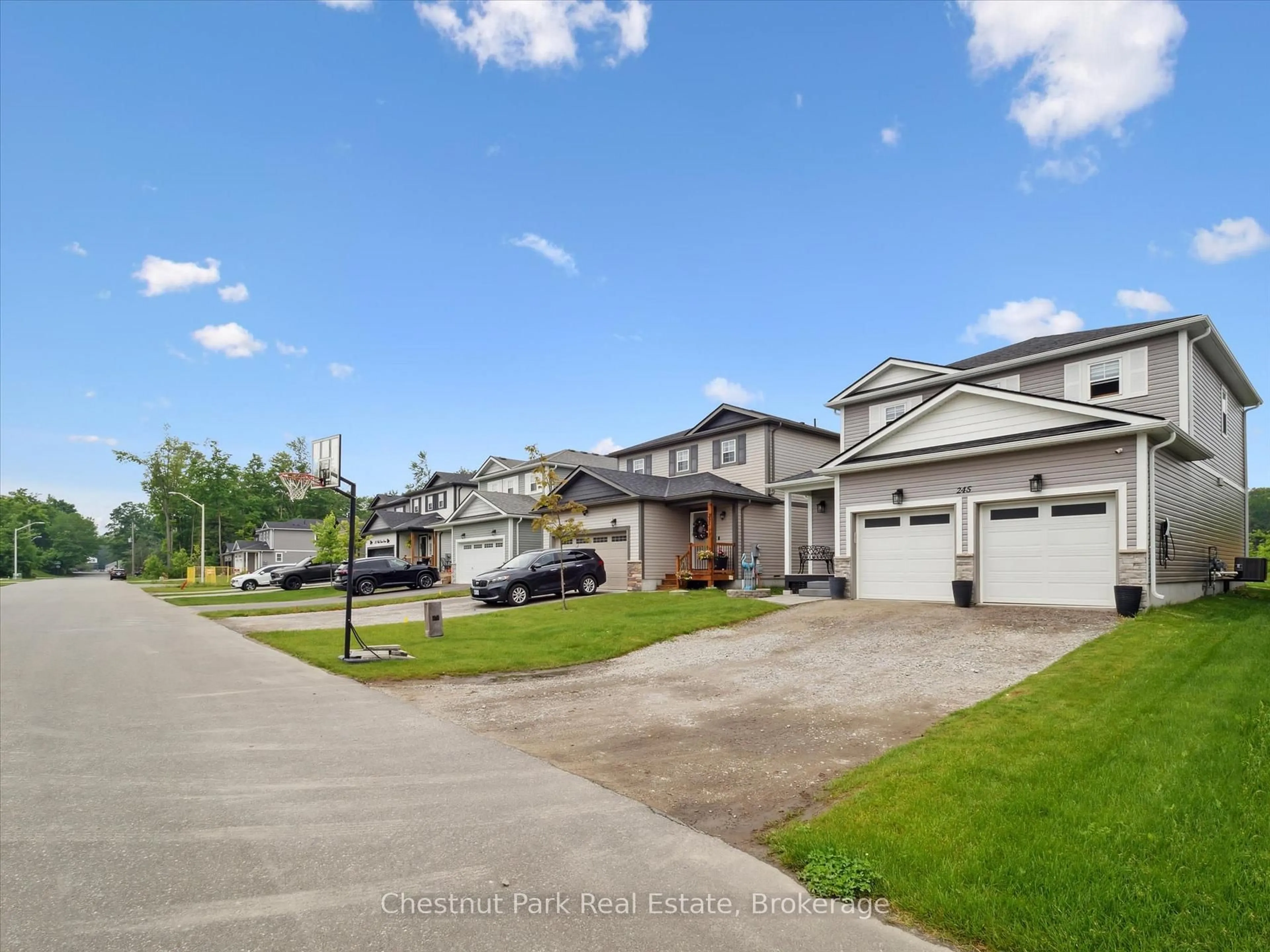 A pic from outside/outdoor area/front of a property/back of a property/a pic from drone, street for 245 Wild Rose Dr, Gravenhurst Ontario P1P 0B4
