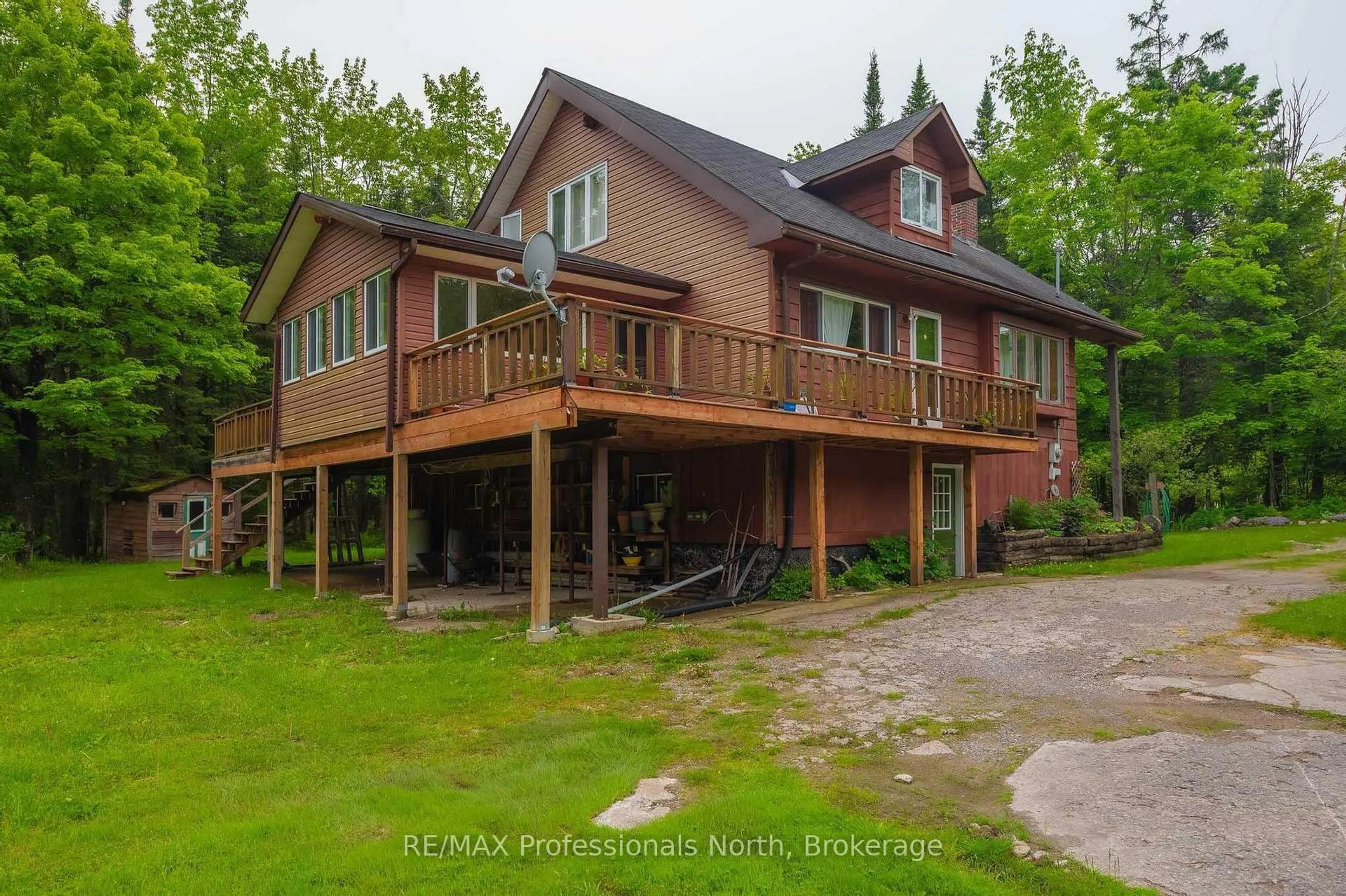A pic from outside/outdoor area/front of a property/back of a property/a pic from drone, water/lake/river/ocean view for 1195 Denna Lake Rd, Minden Hills Ontario K0M 2K0