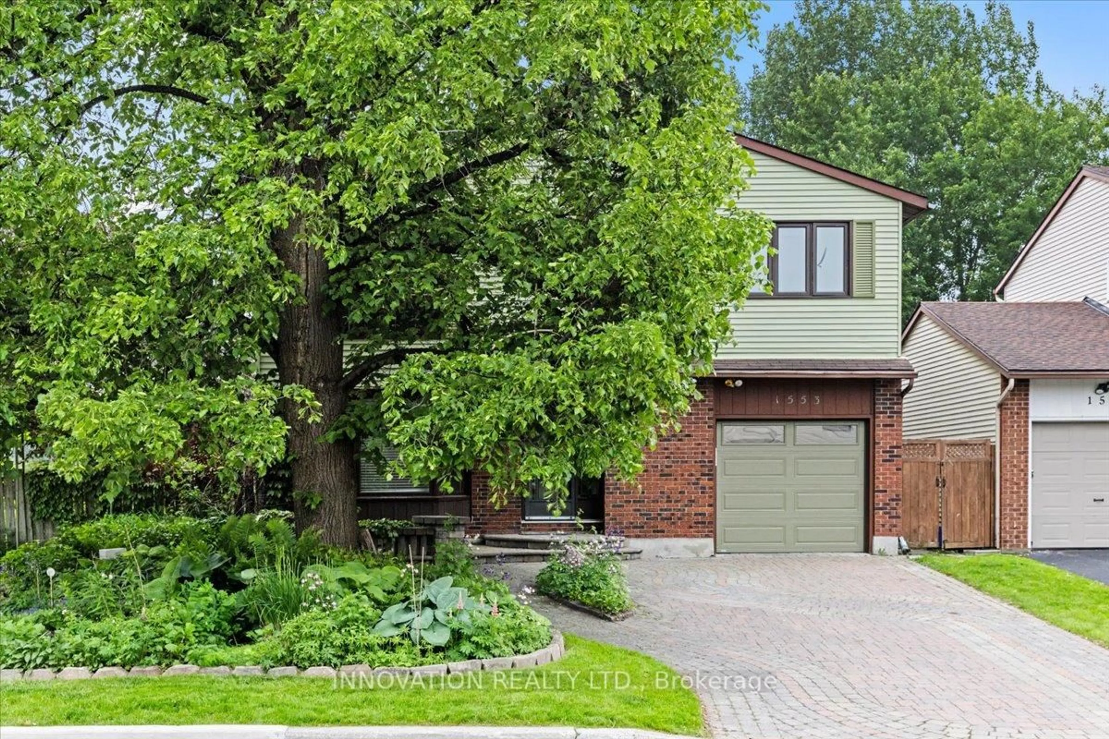 Home with brick exterior material, street for 1553 Marcoux Dr, Orleans Ontario K1E 2K5