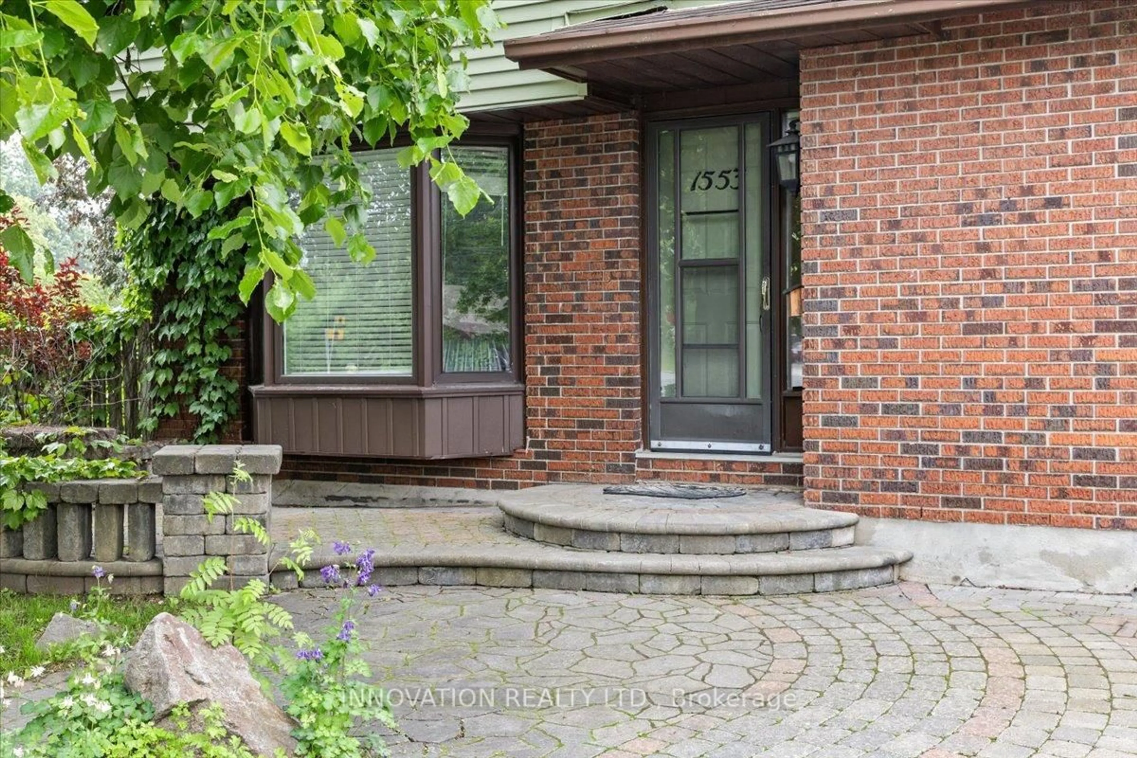 Home with brick exterior material, street for 1553 Marcoux Dr, Orleans Ontario K1E 2K5