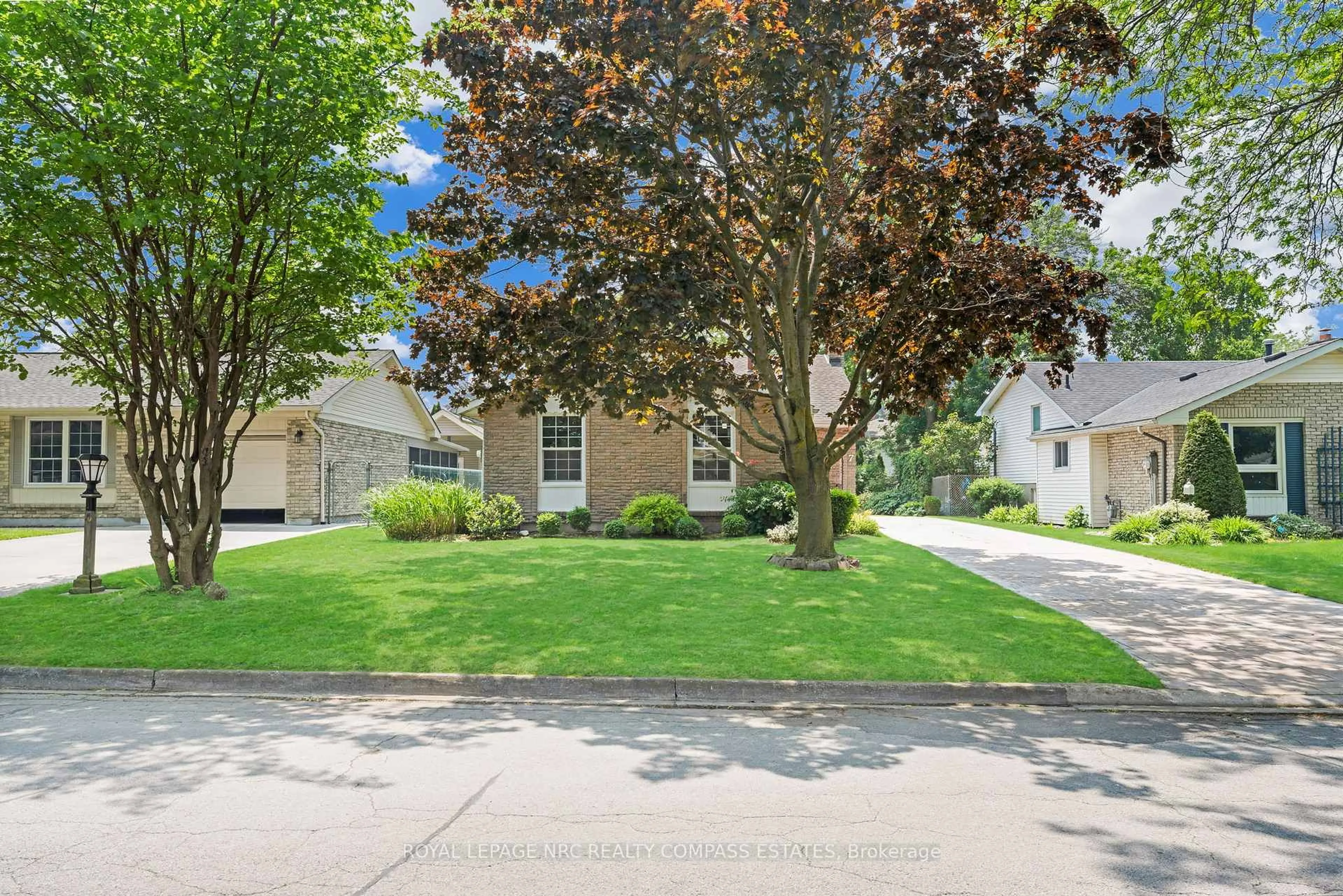 A pic from outside/outdoor area/front of a property/back of a property/a pic from drone, street for 7 Belair Dr, St. Catharines Ontario L2N 6X7