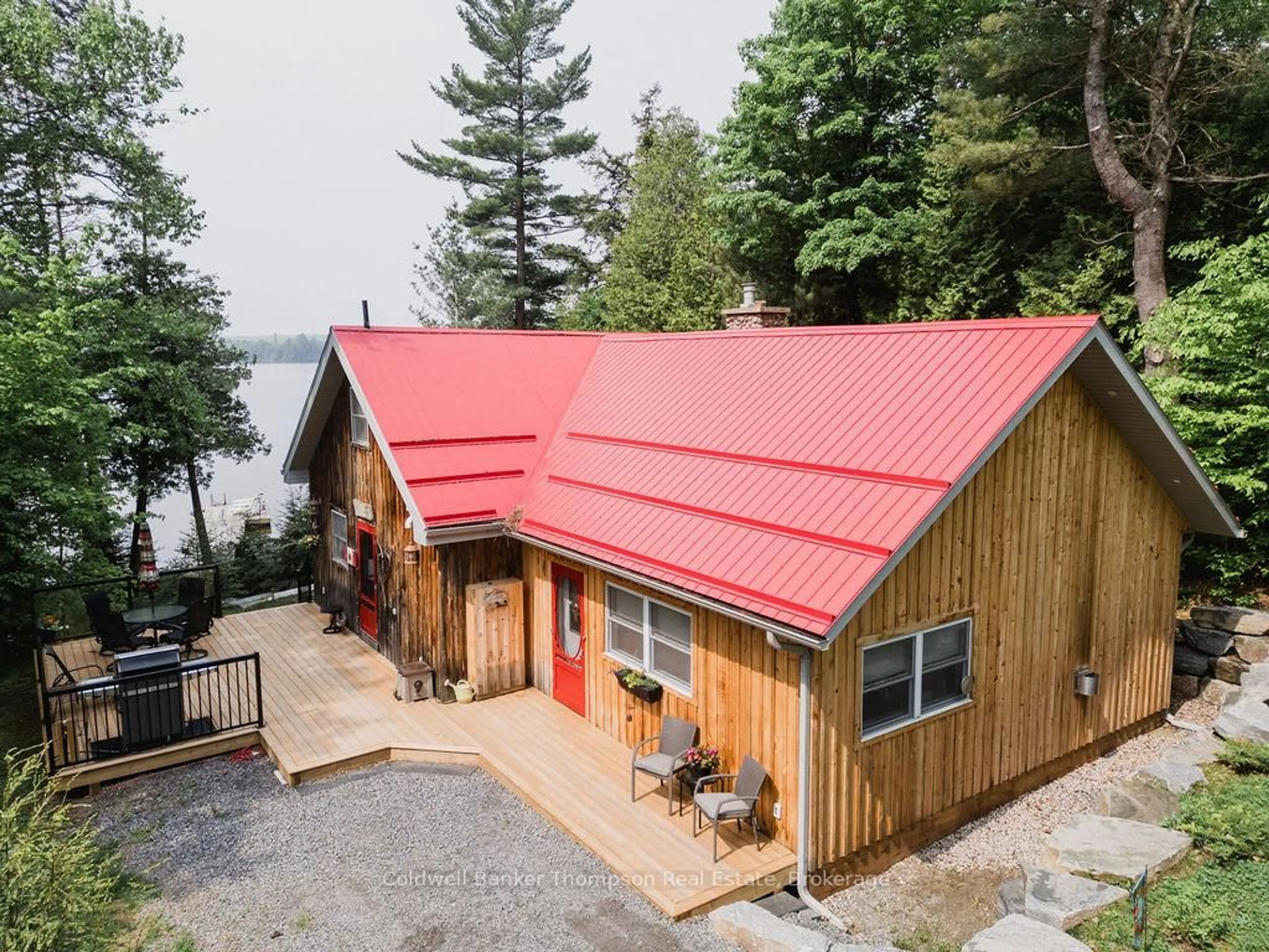 A pic from outside/outdoor area/front of a property/back of a property/a pic from drone, water/lake/river/ocean view for 219 Hawthorne Dr, Machar Ontario P0A 1X0