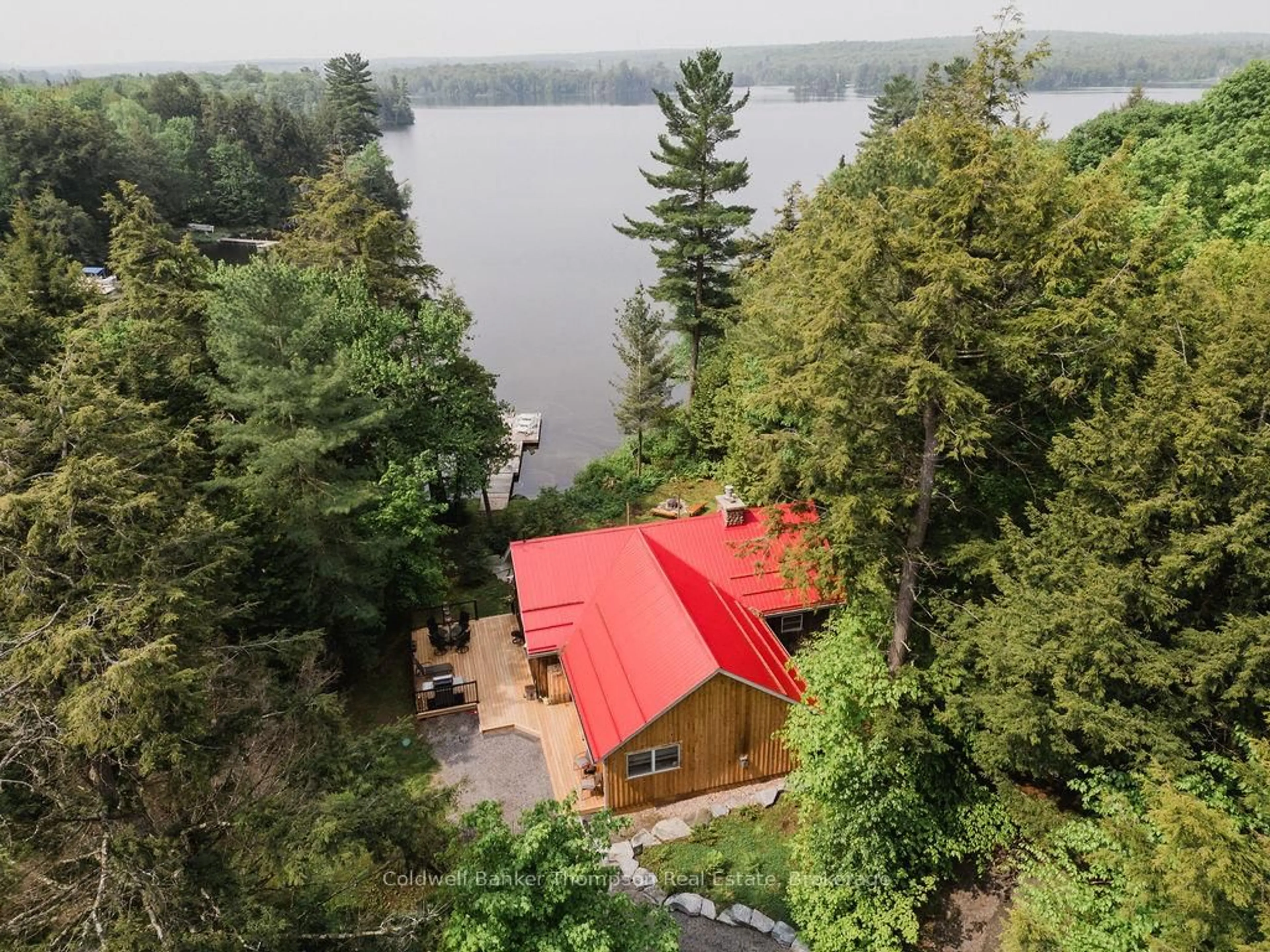 A pic from outside/outdoor area/front of a property/back of a property/a pic from drone, water/lake/river/ocean view for 219 Hawthorne Dr, Machar Ontario P0A 1X0