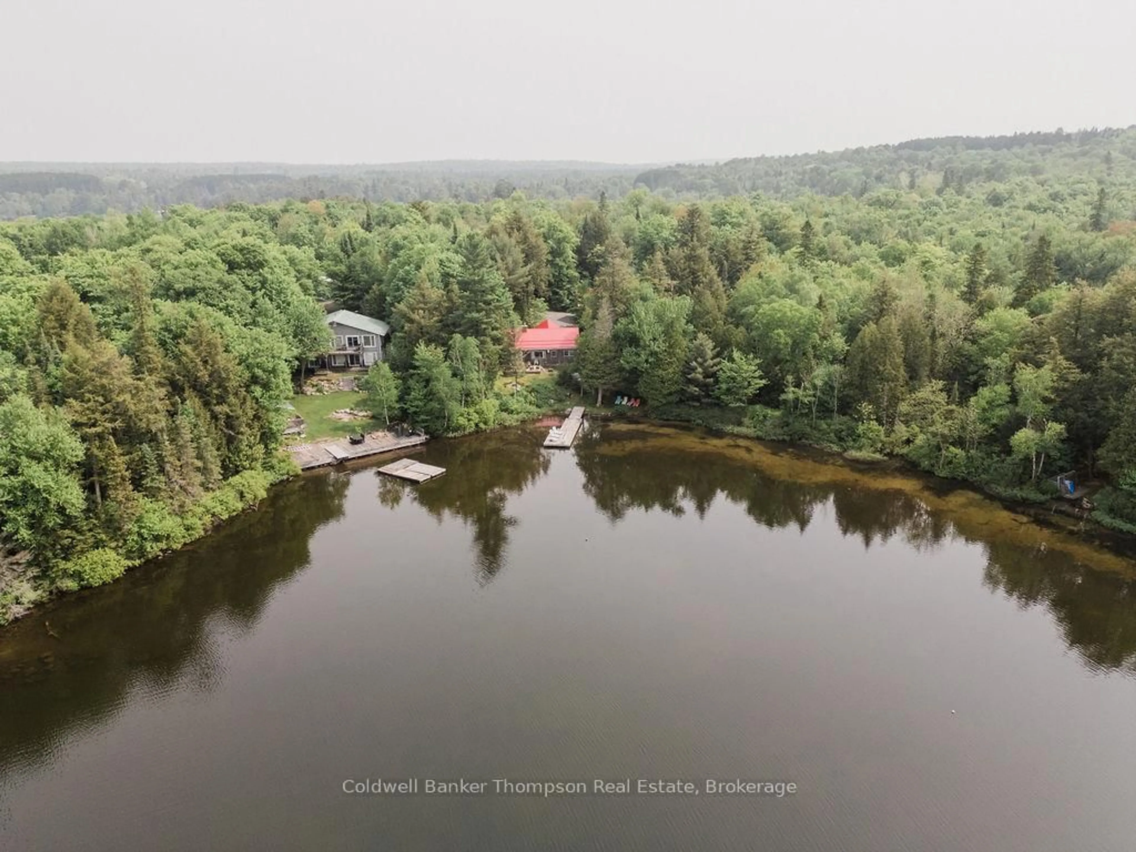 A pic from outside/outdoor area/front of a property/back of a property/a pic from drone, water/lake/river/ocean view for 219 Hawthorne Dr, Machar Ontario P0A 1X0