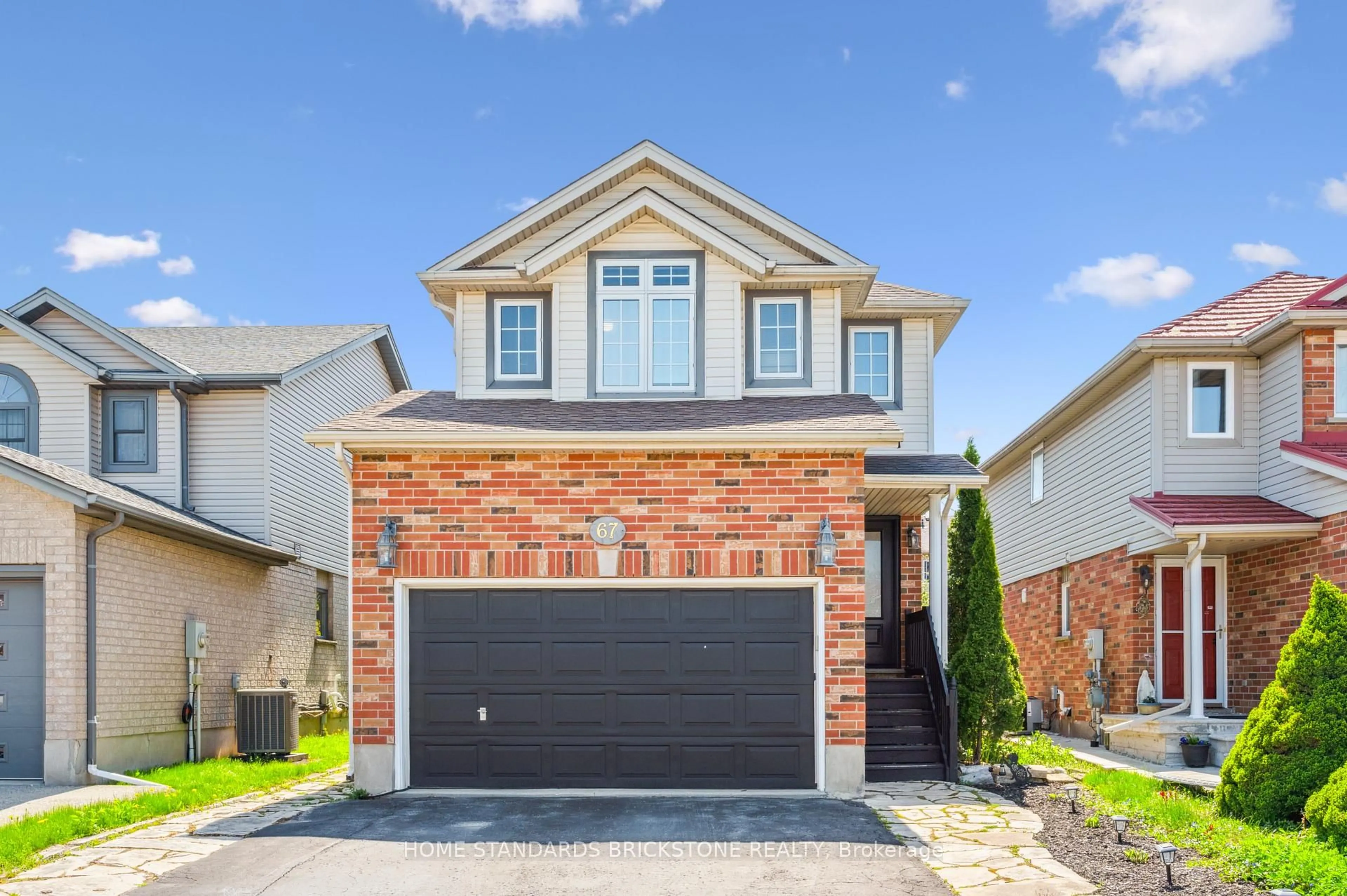 Home with brick exterior material, street for 67 Cotton Grass St, Kitchener Ontario N2E 3T7
