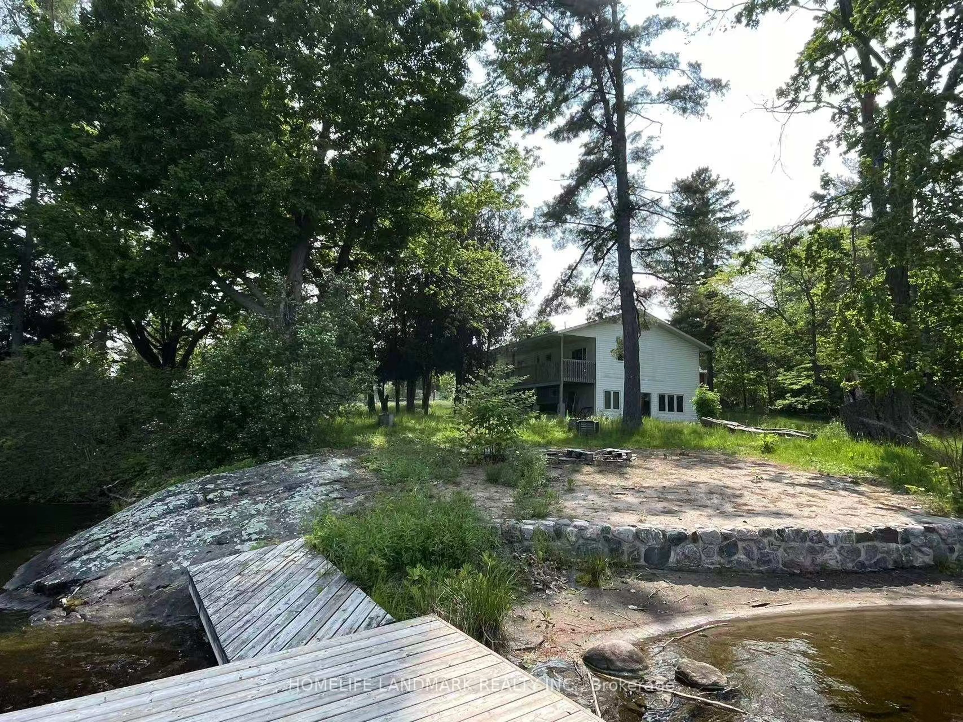 A pic from outside/outdoor area/front of a property/back of a property/a pic from drone, forest/trees view for 149 WILLIAM St, Parry Sound Ontario P2A 1W3