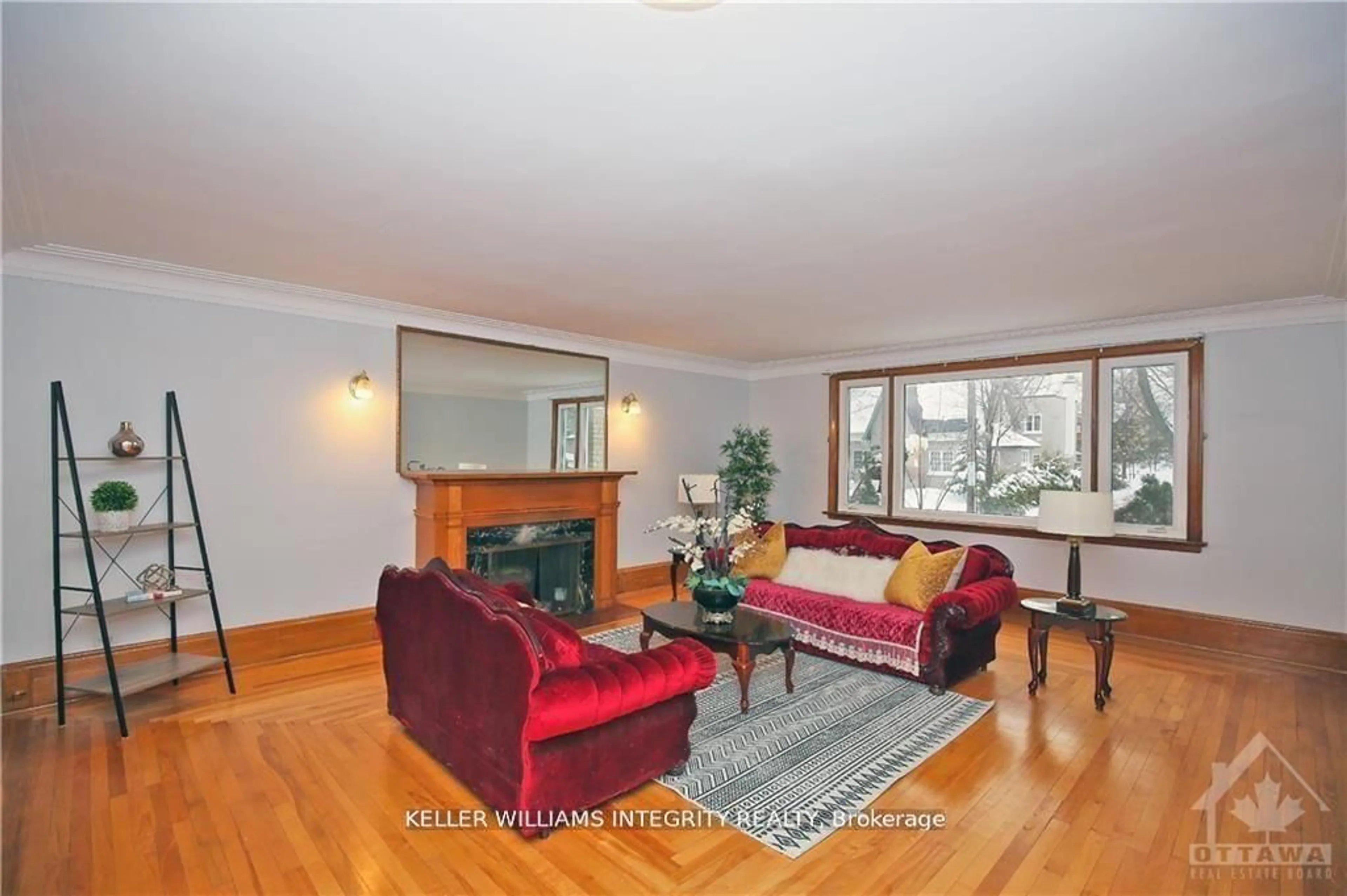 Living room with furniture, wood/laminate floor for 39 GOULBURN Ave, Ottawa Ontario K1N 8C7