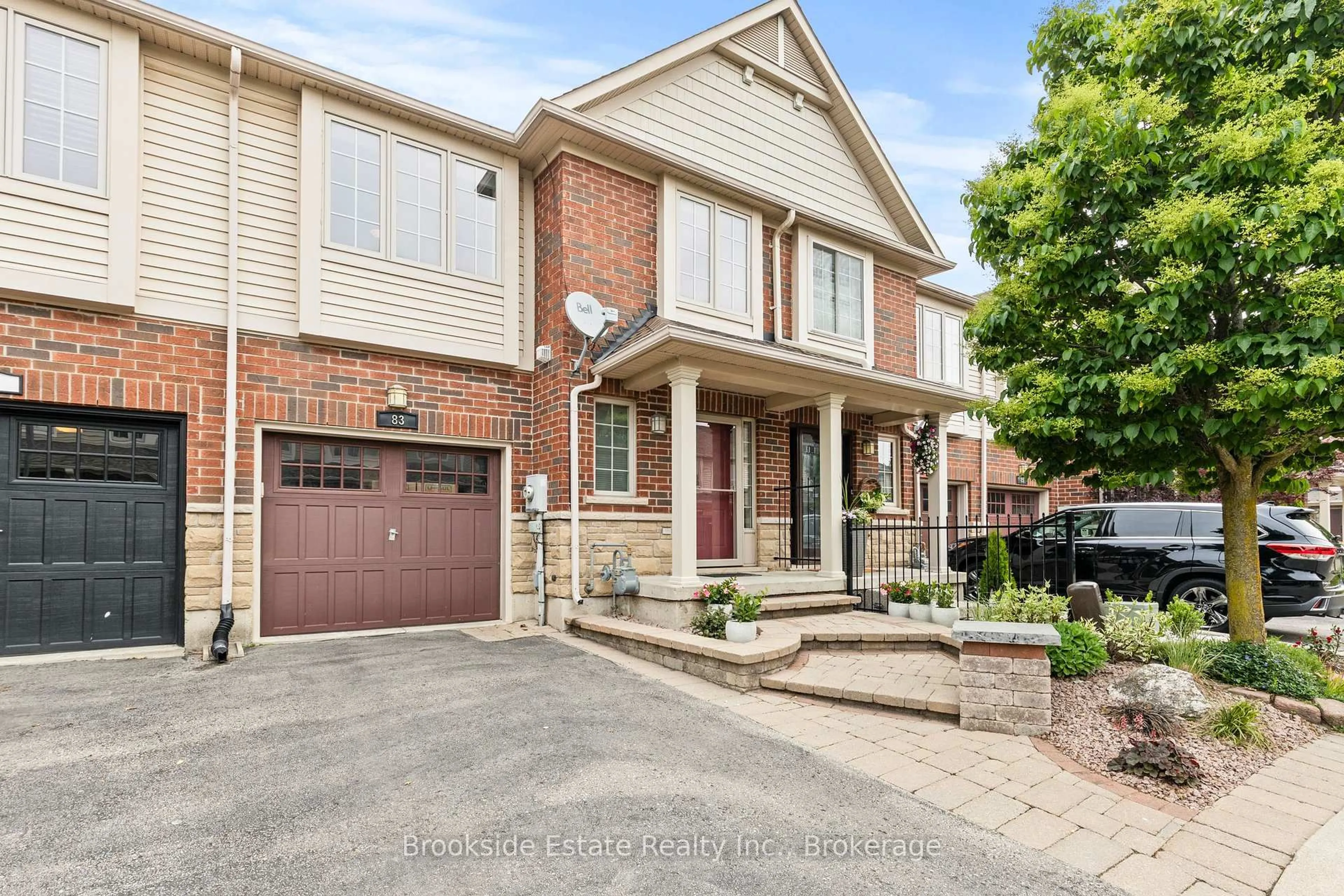 Home with brick exterior material, street for 222 Fall Fair Way #83, Hamilton Ontario L0R 1C0