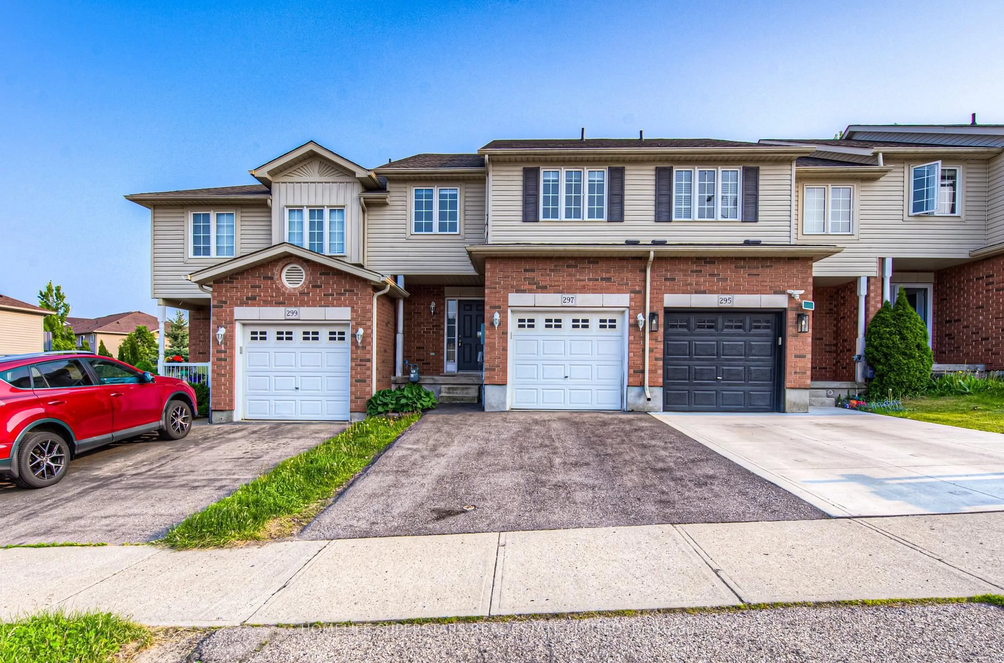 Home with brick exterior material, street for 297 BRIARMEADOW DR, Kitchener Ontario N2A 4K9