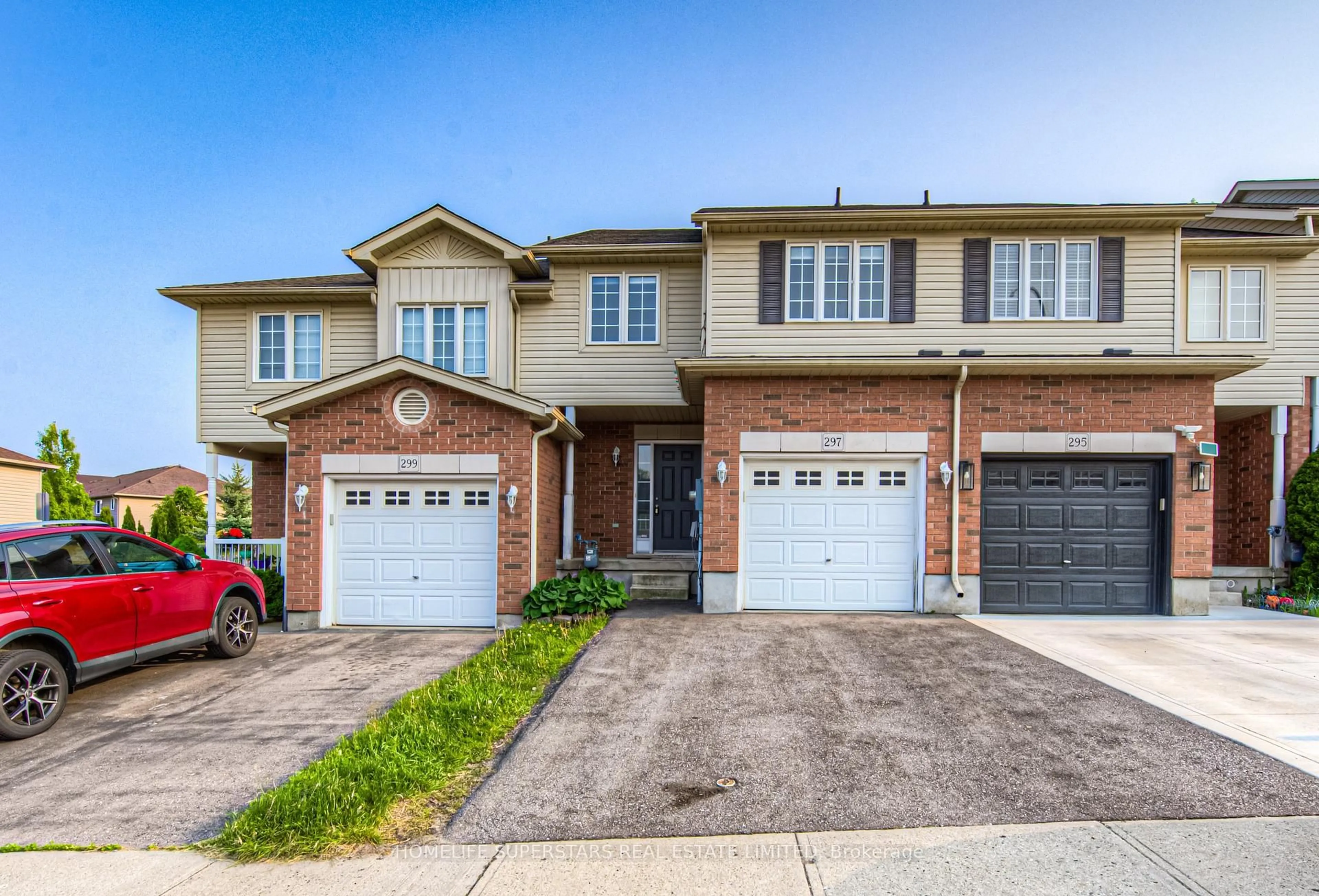 Home with brick exterior material, street for 297 BRIARMEADOW DR, Kitchener Ontario N2A 4K9