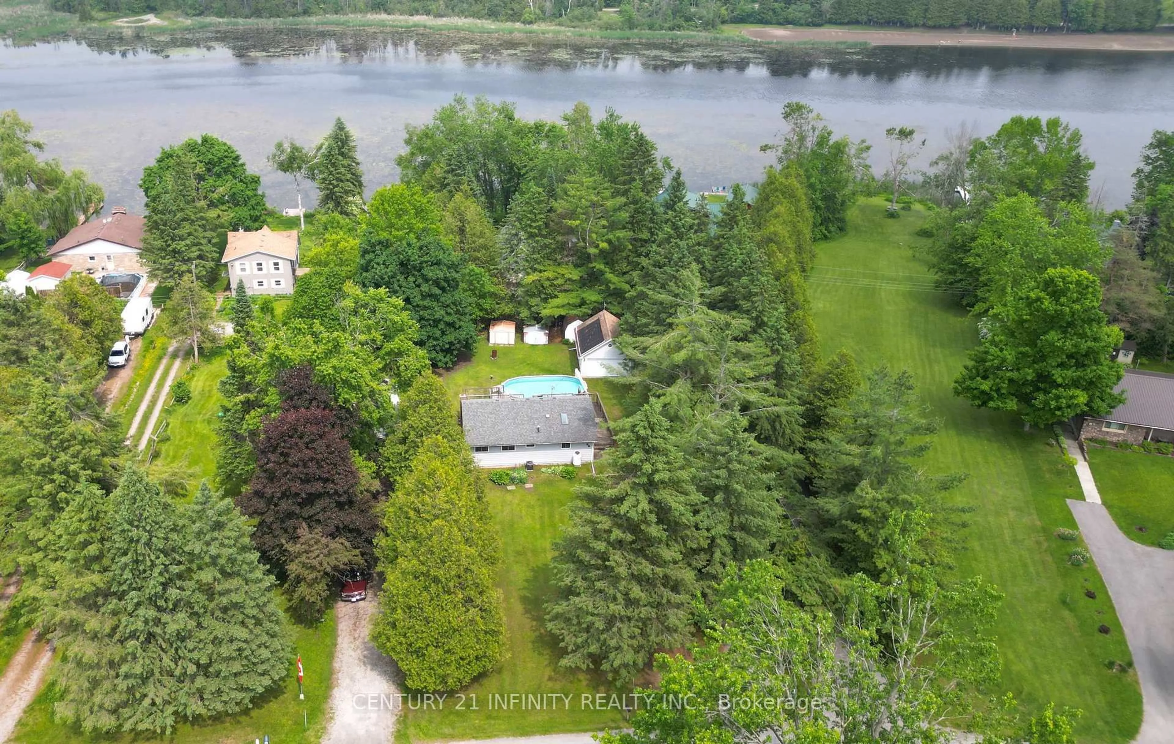 A pic from outside/outdoor area/front of a property/back of a property/a pic from drone, water/lake/river/ocean view for 66 Cowans Cres, Kawartha Lakes Ontario K0L 2W0