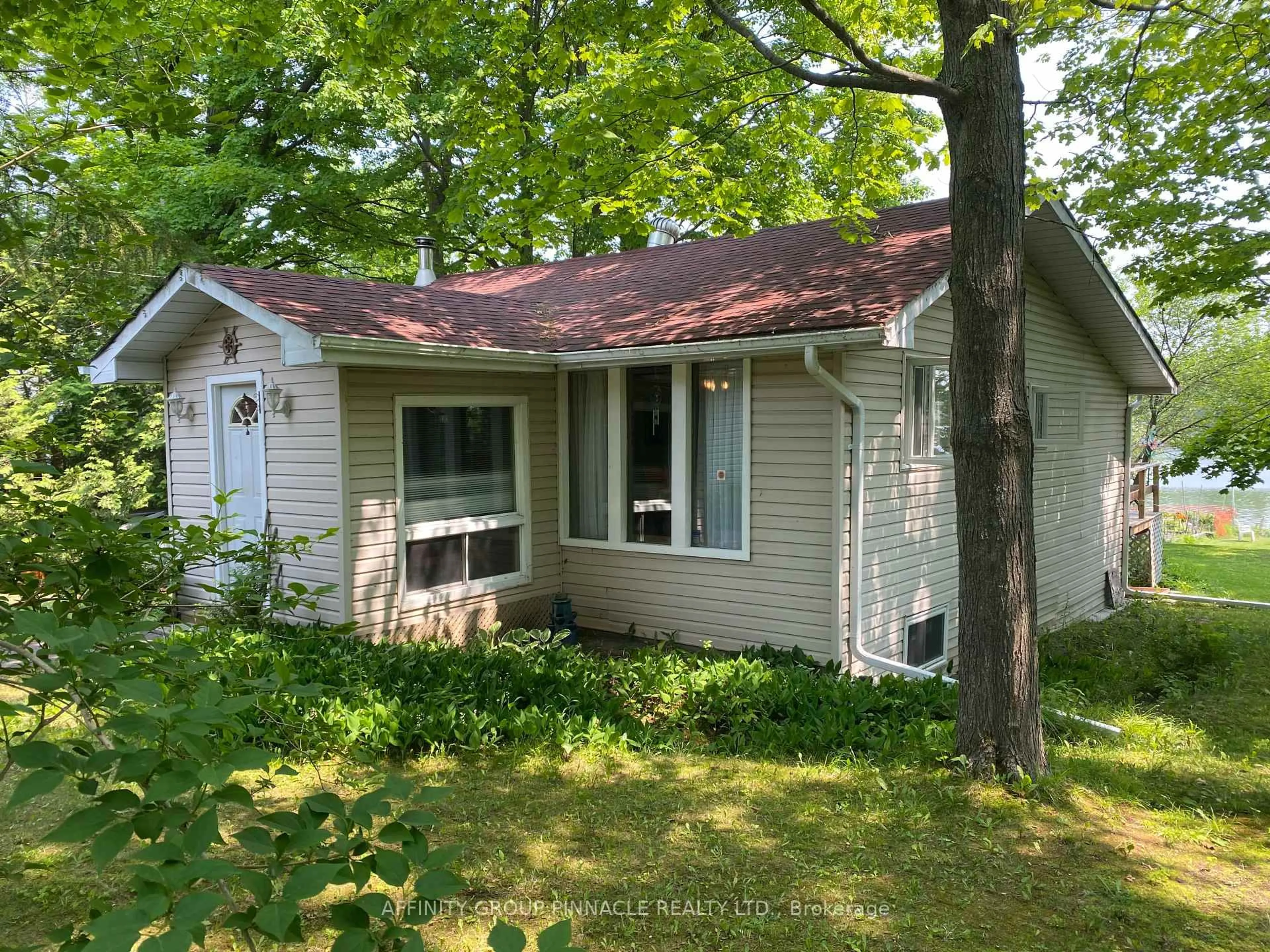 Home with vinyl exterior material, street for 1314 Portage Rd, Kawartha Lakes Ontario K0M 2B0