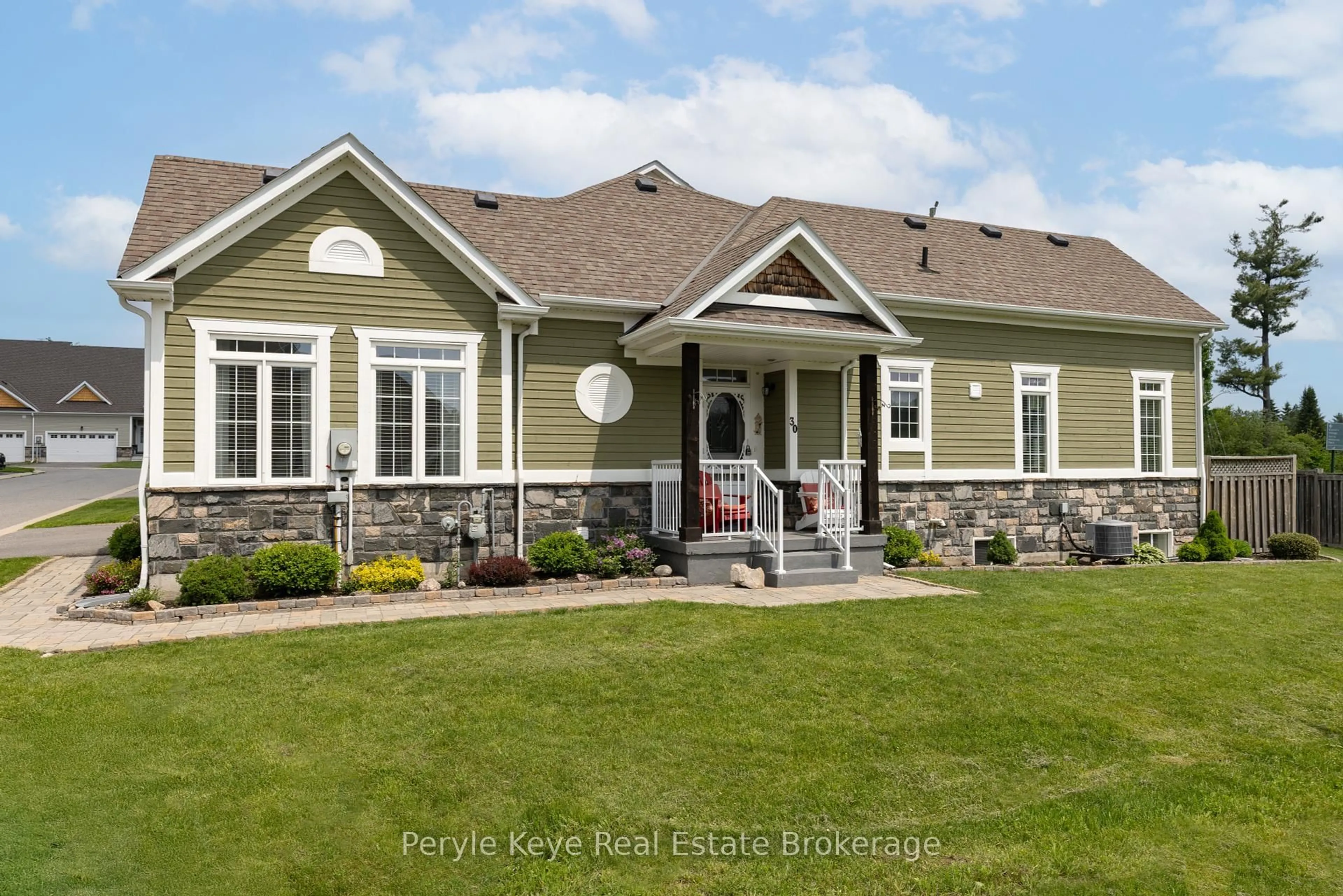 Home with vinyl exterior material, street for 30 Durham Rd, Bracebridge Ontario P1L 0B7