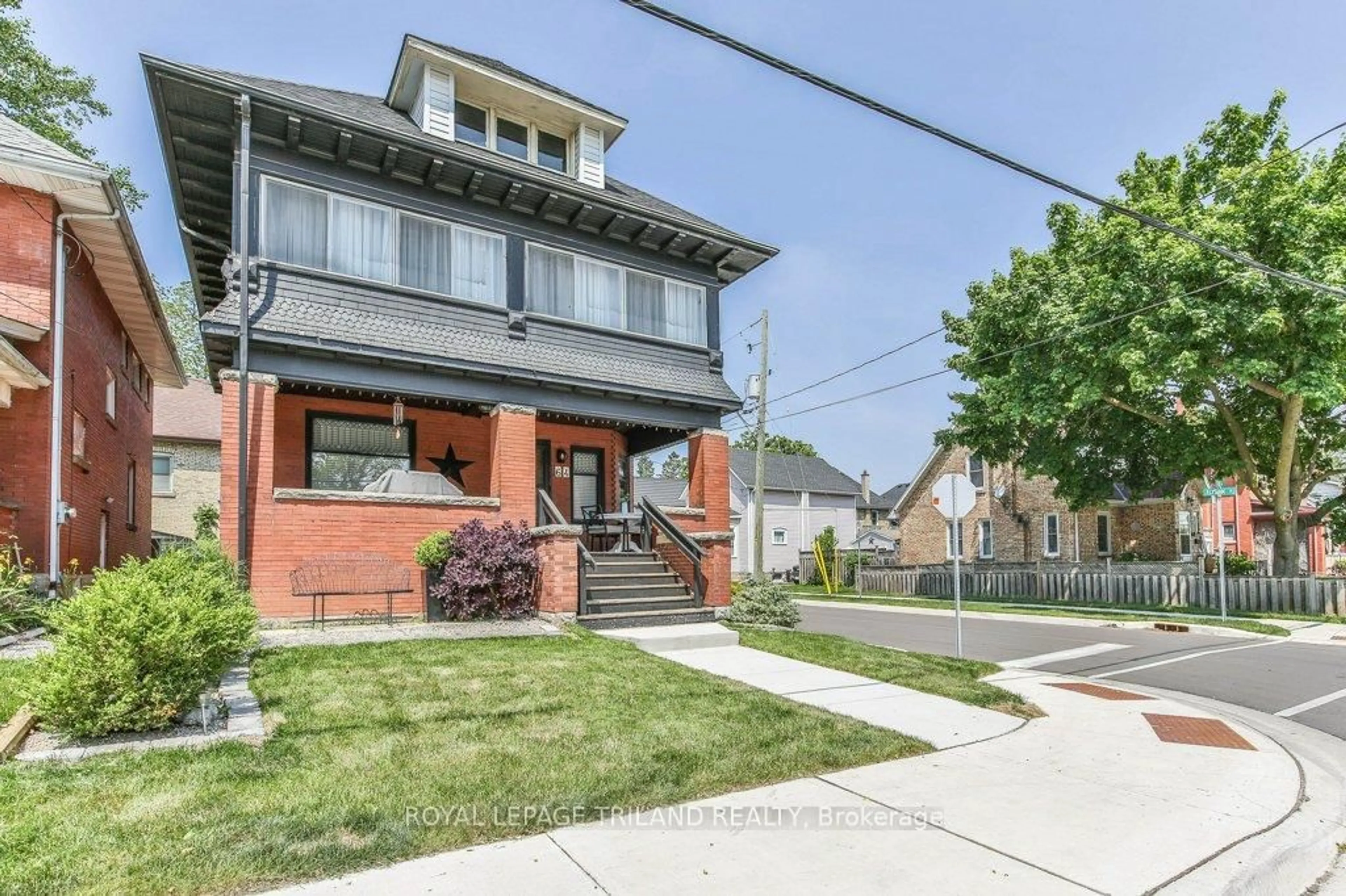 Home with brick exterior material, street for 64 EAST St, St. Thomas Ontario N5P 1R9