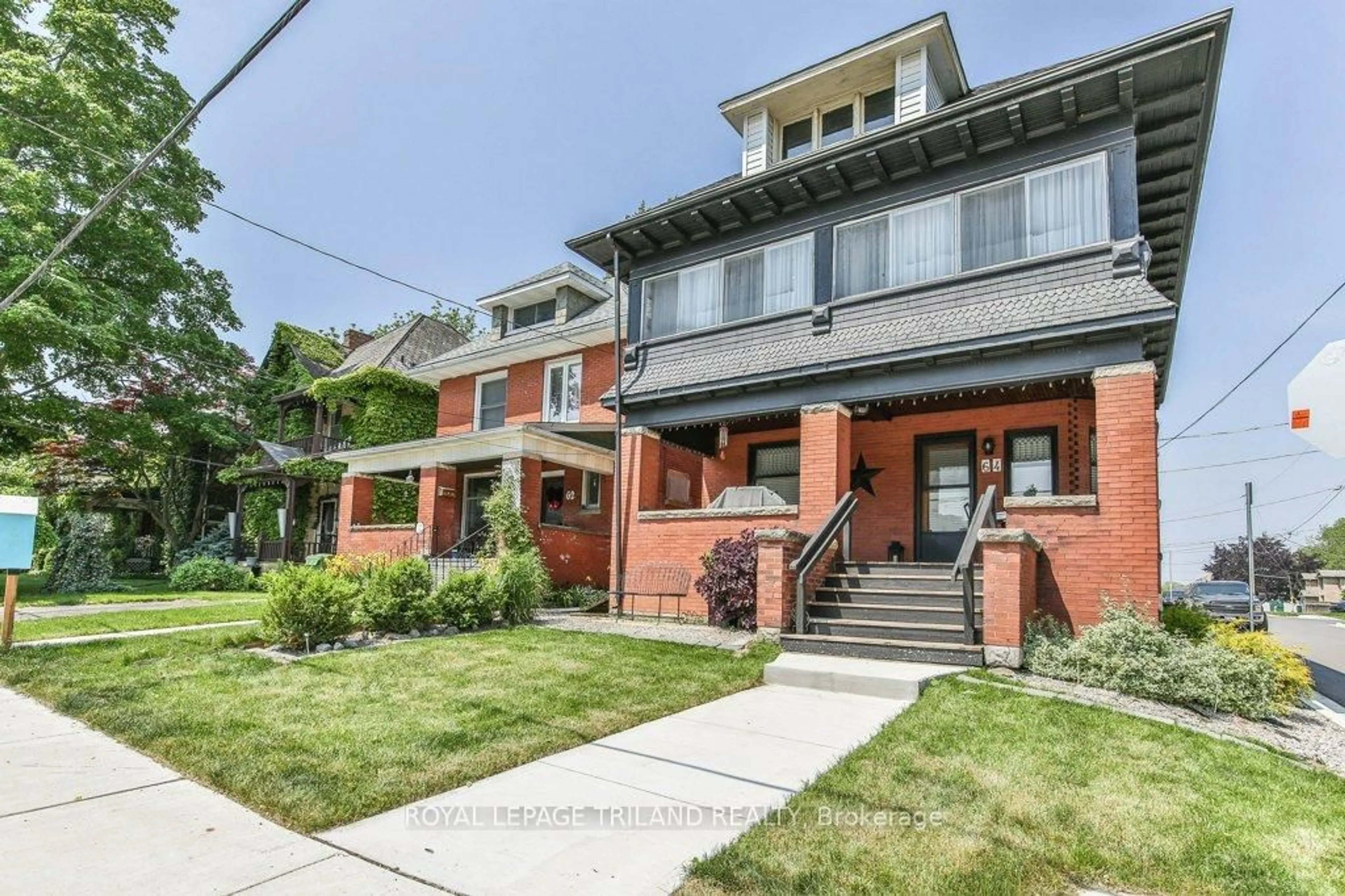 Home with brick exterior material, street for 64 EAST St, St. Thomas Ontario N5P 1R9