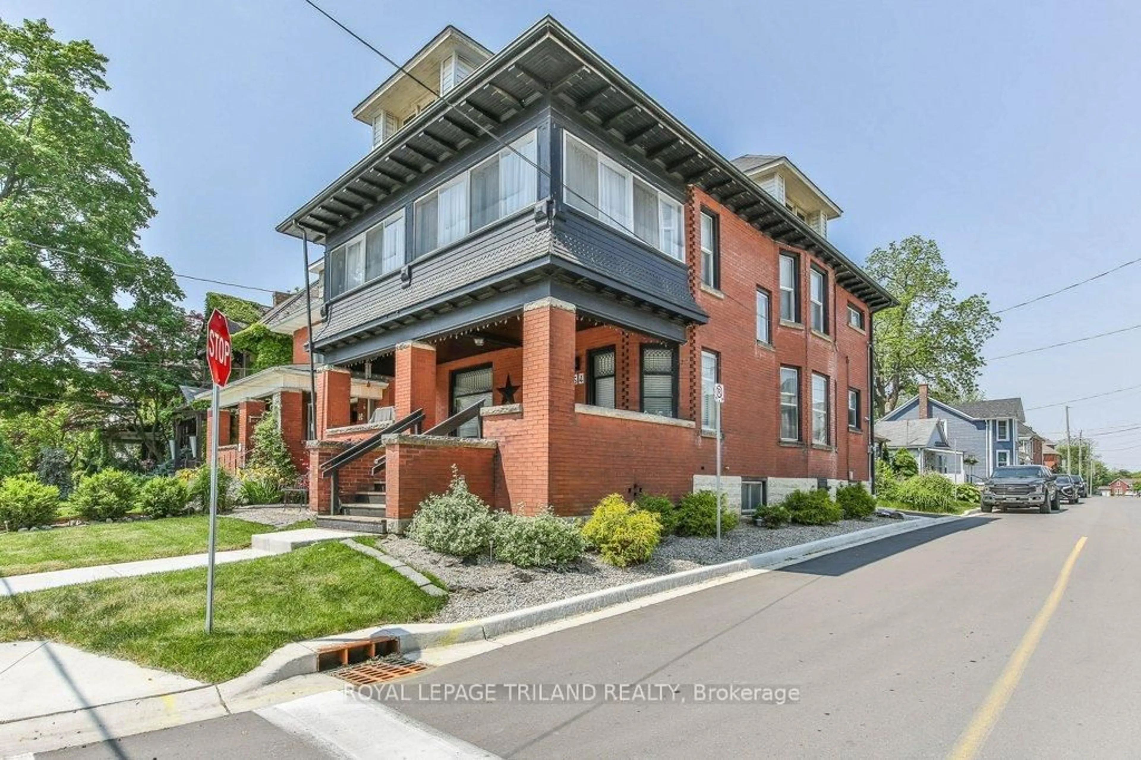 Home with brick exterior material, street for 64 EAST St, St. Thomas Ontario N5P 1R9