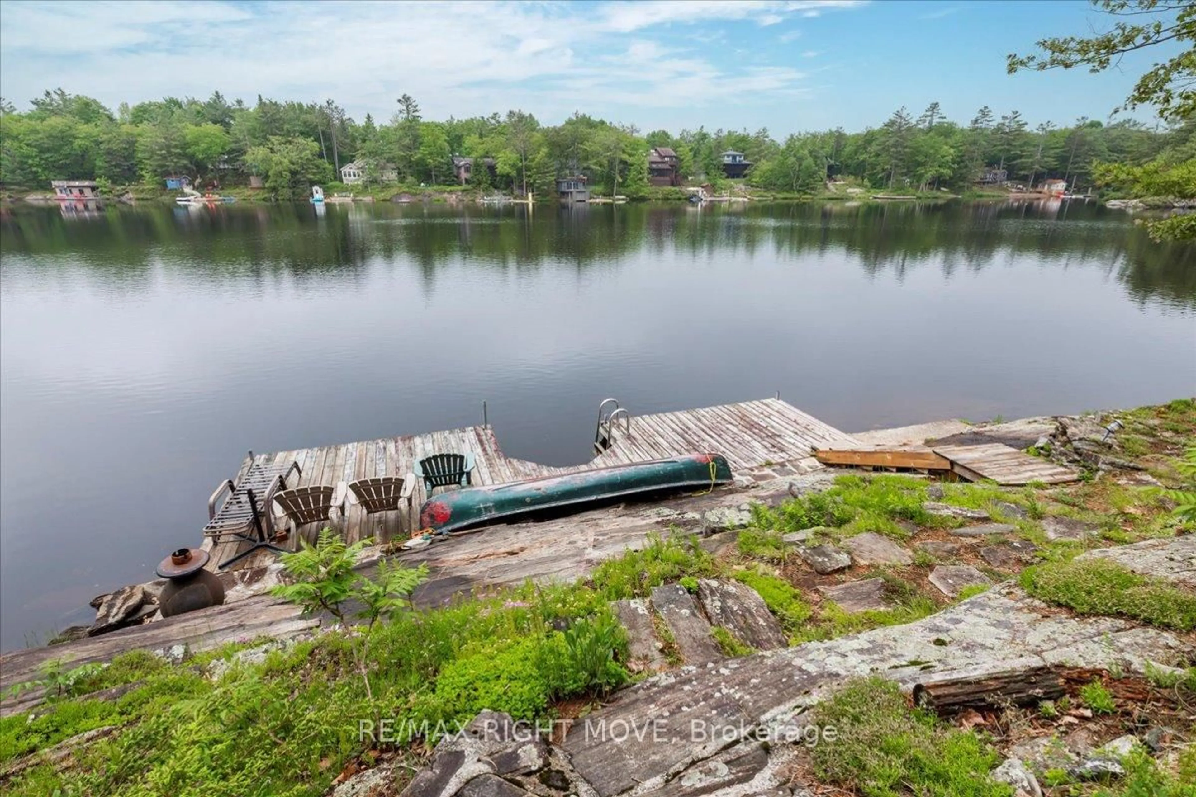 A pic from outside/outdoor area/front of a property/back of a property/a pic from drone, water/lake/river/ocean view for 16-17 Loon Lake Rd, Gravenhurst Ontario P1P 0E5