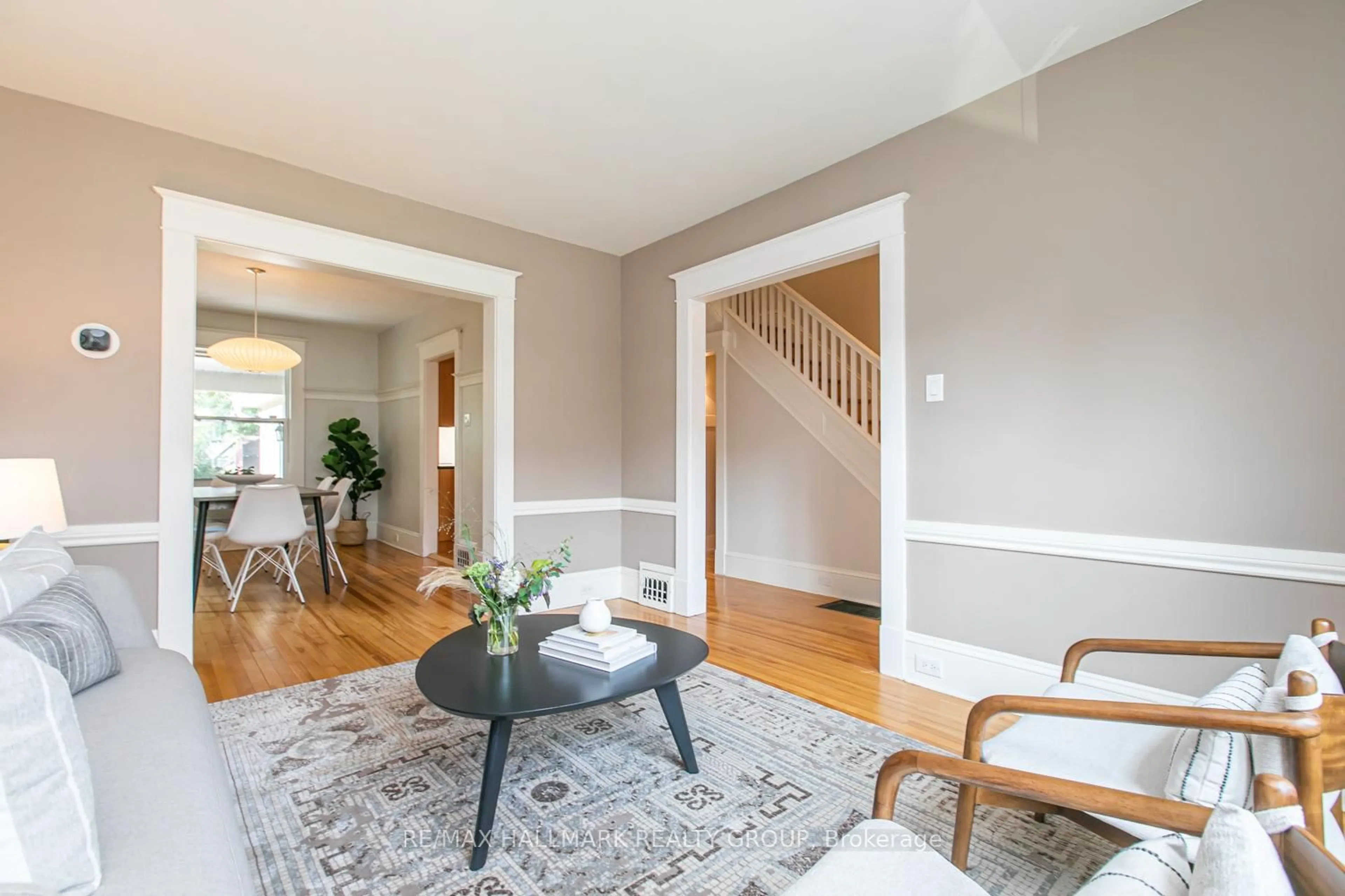 Living room with furniture, wood/laminate floor for 636 Chapel St, Ottawa Ontario K1N 7Z9