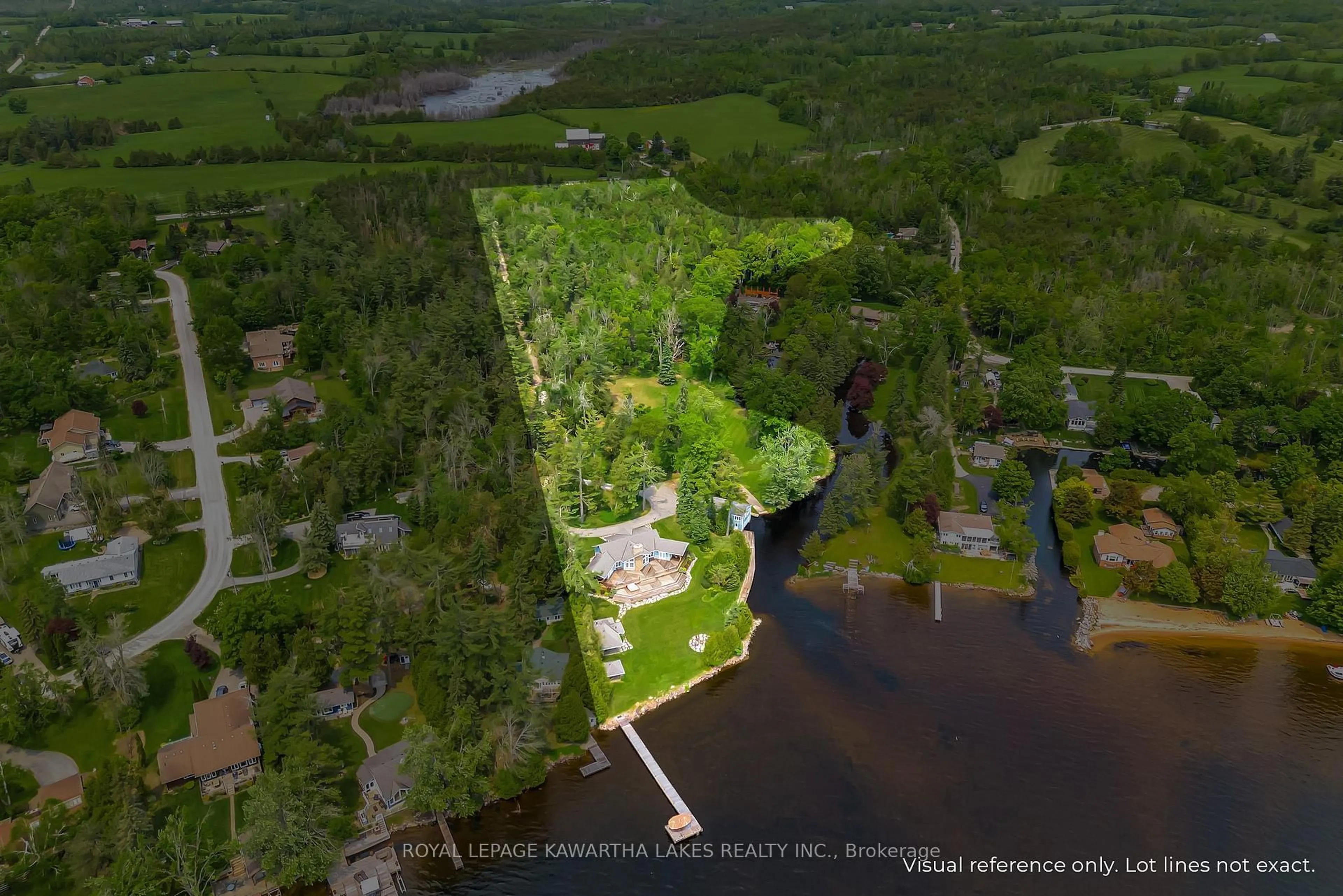 A pic from outside/outdoor area/front of a property/back of a property/a pic from drone, water/lake/river/ocean view for 1484 County Road 8, Kawartha Lakes Ontario K0M 1N0
