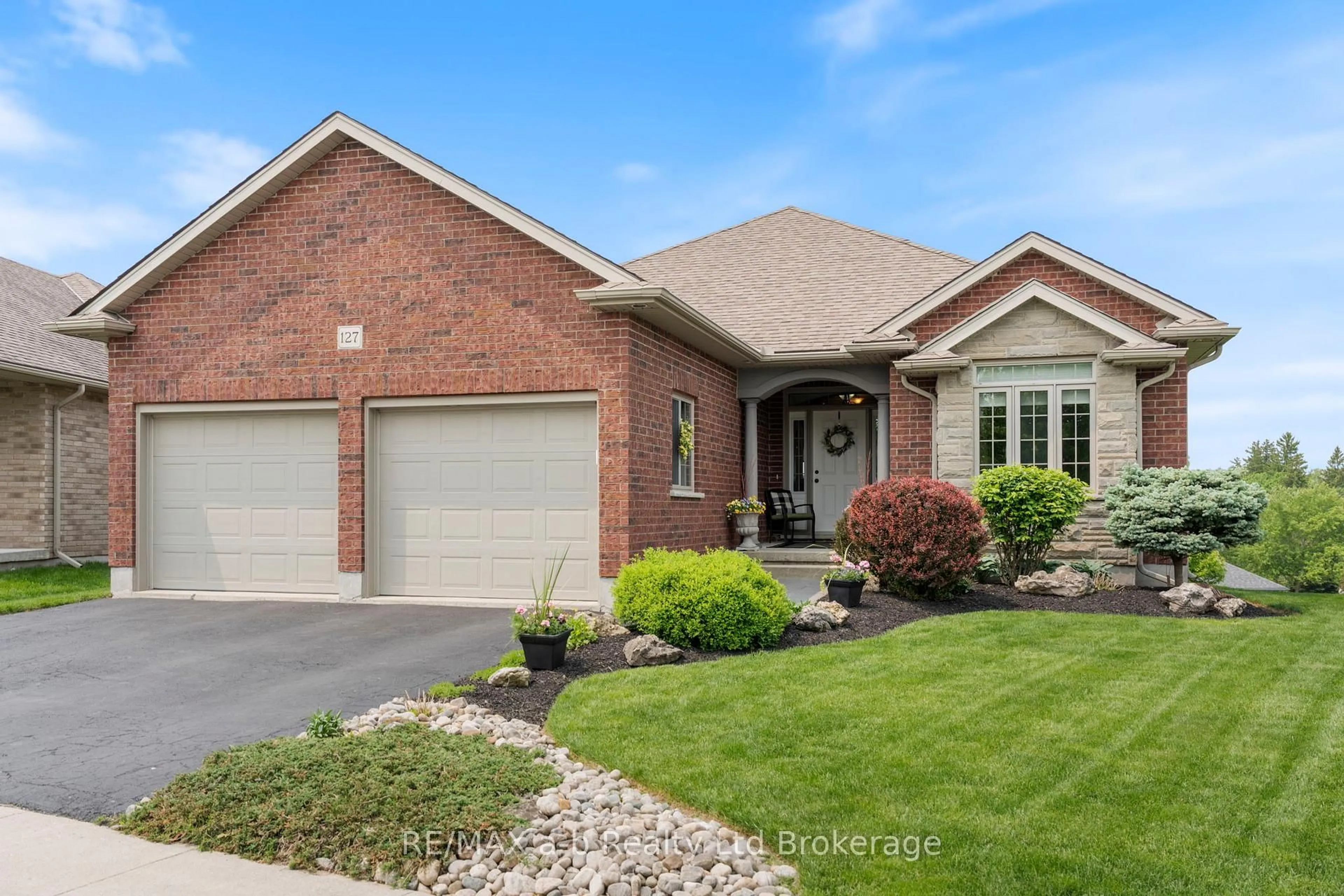 Home with brick exterior material, street for 127 Gerber Meadows Dr, Wellesley Ontario N0B 2T0