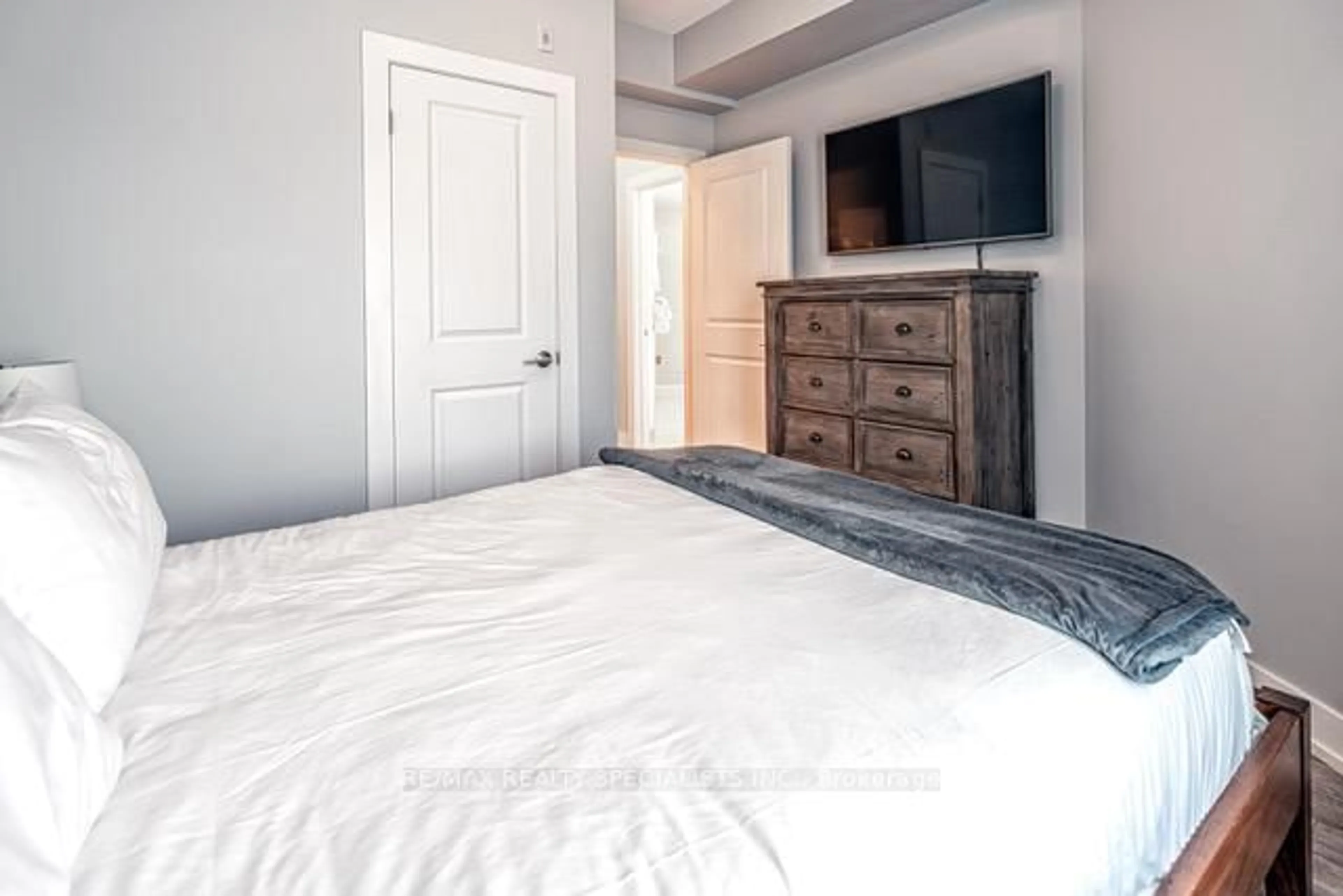 Bedroom with bed, unknown for 25 Pen Lake Point Rd #230, Huntsville Ontario P1H 1A9