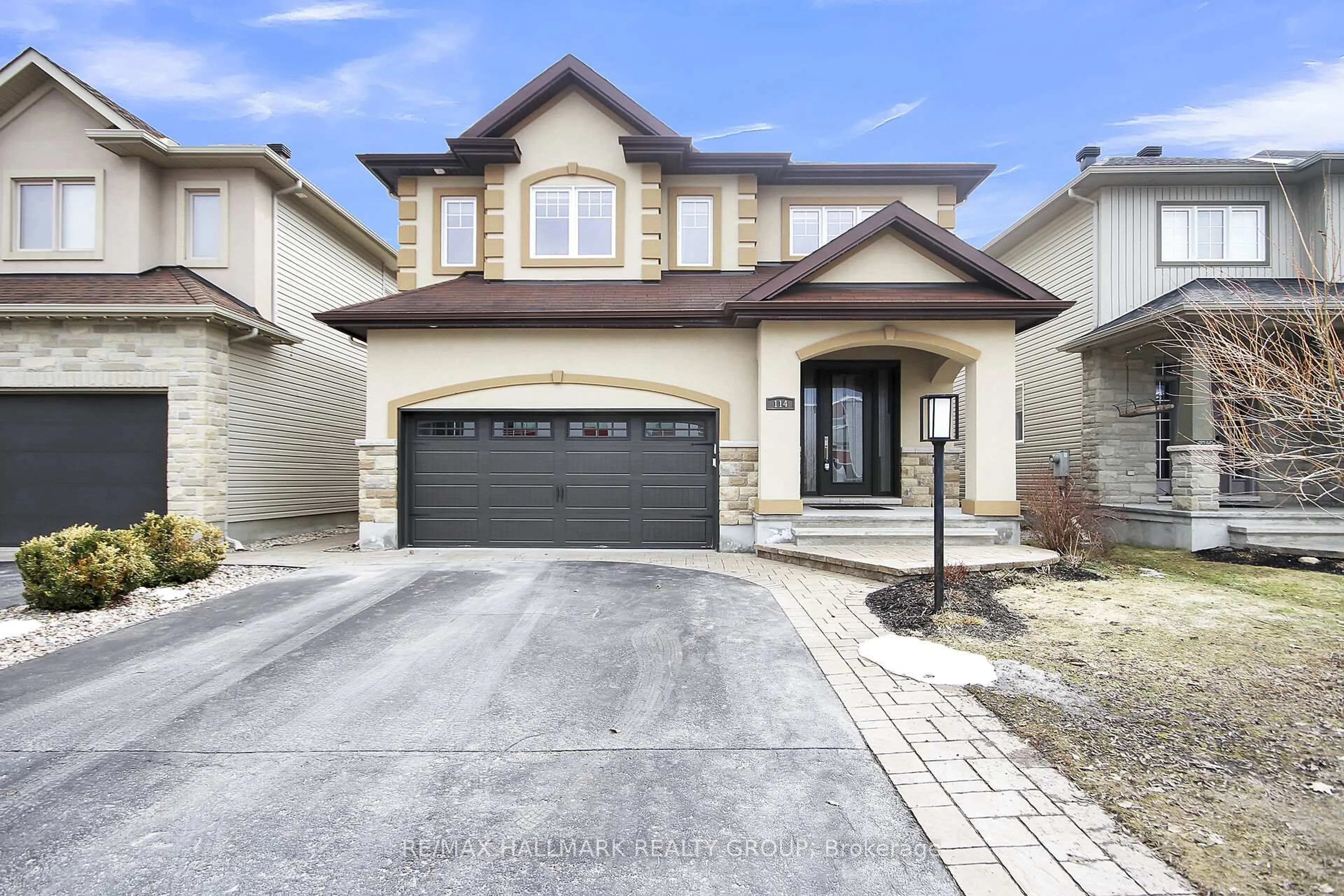 Home with brick exterior material, street for 114 Hartsmere Dr, Stittsville Ontario K2S 2G1
