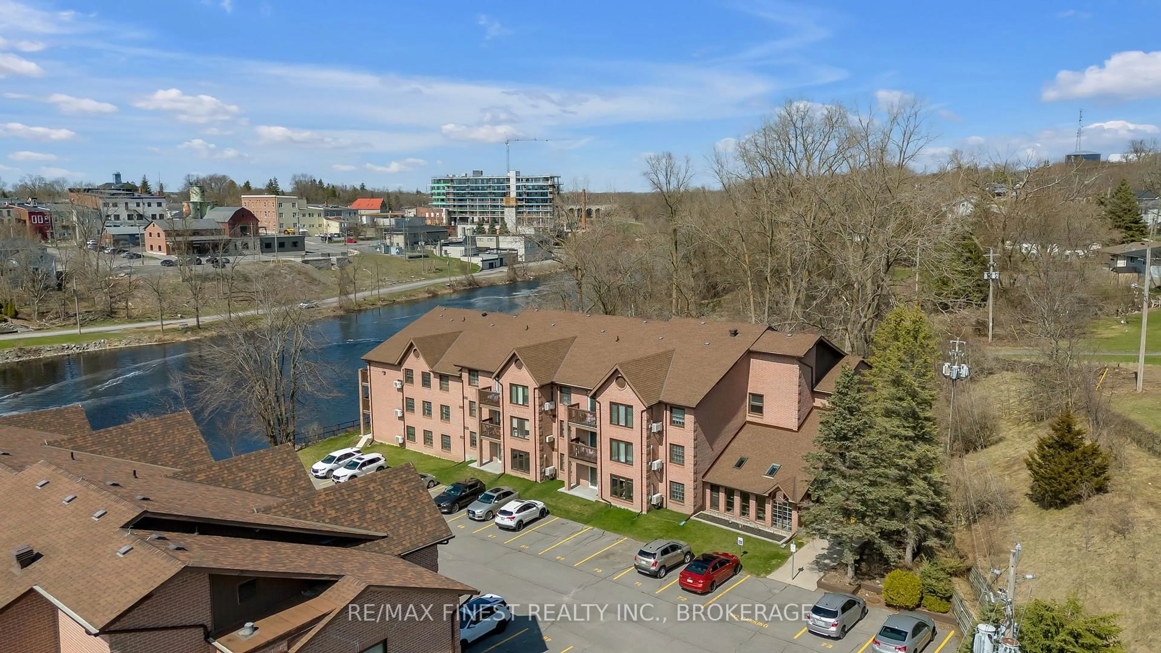 A pic from outside/outdoor area/front of a property/back of a property/a pic from drone, water/lake/river/ocean view for 11 Centre St #205, Greater Napanee Ontario K7R 3X3