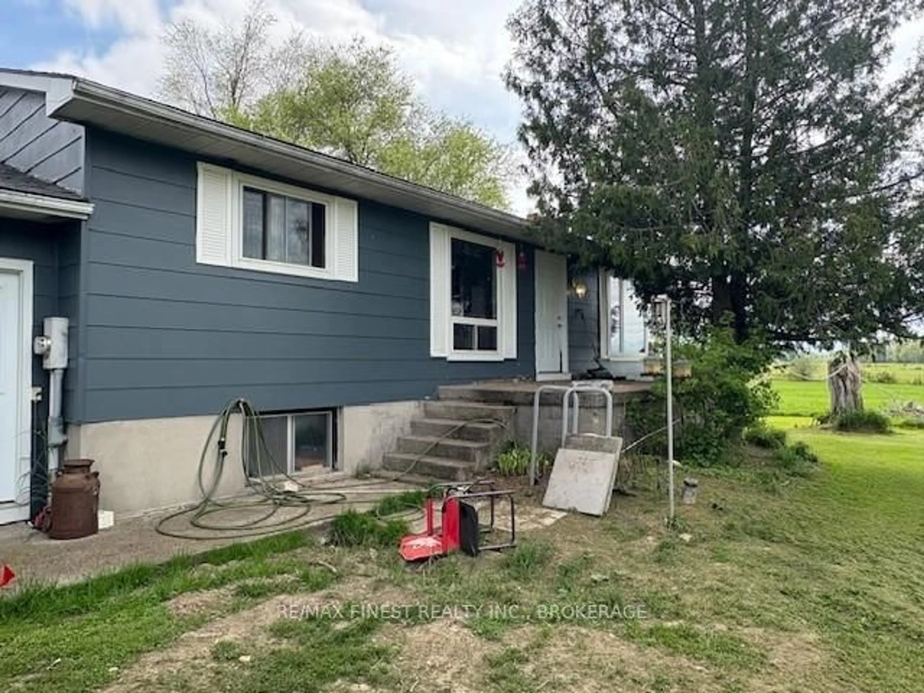 Home with vinyl exterior material, street for 4879 Accommodation Rd, Kingston Ontario K7P 0L8