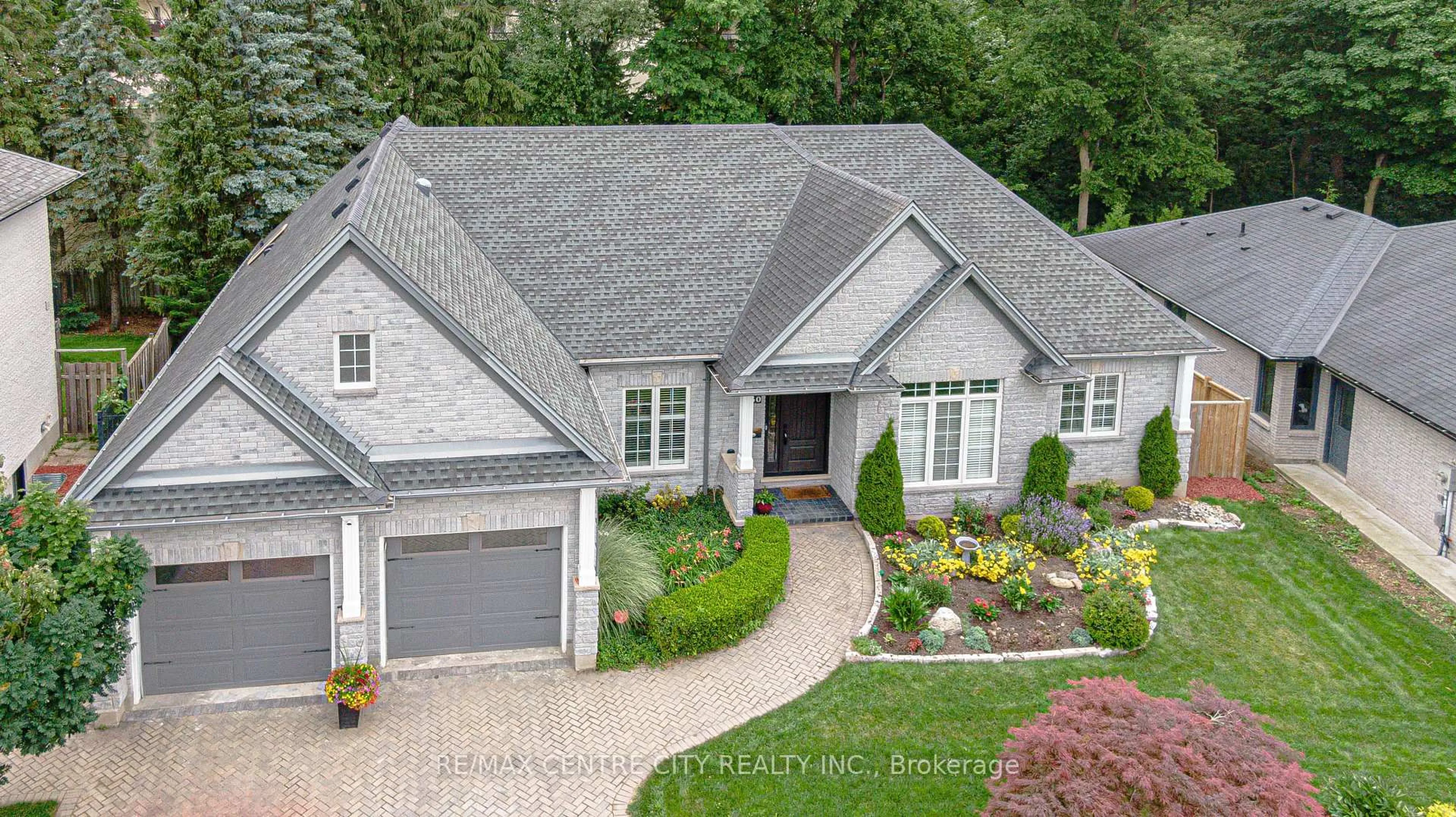 Home with brick exterior material, street for 50 Exmoor Pl, London North Ontario N5X 3W2