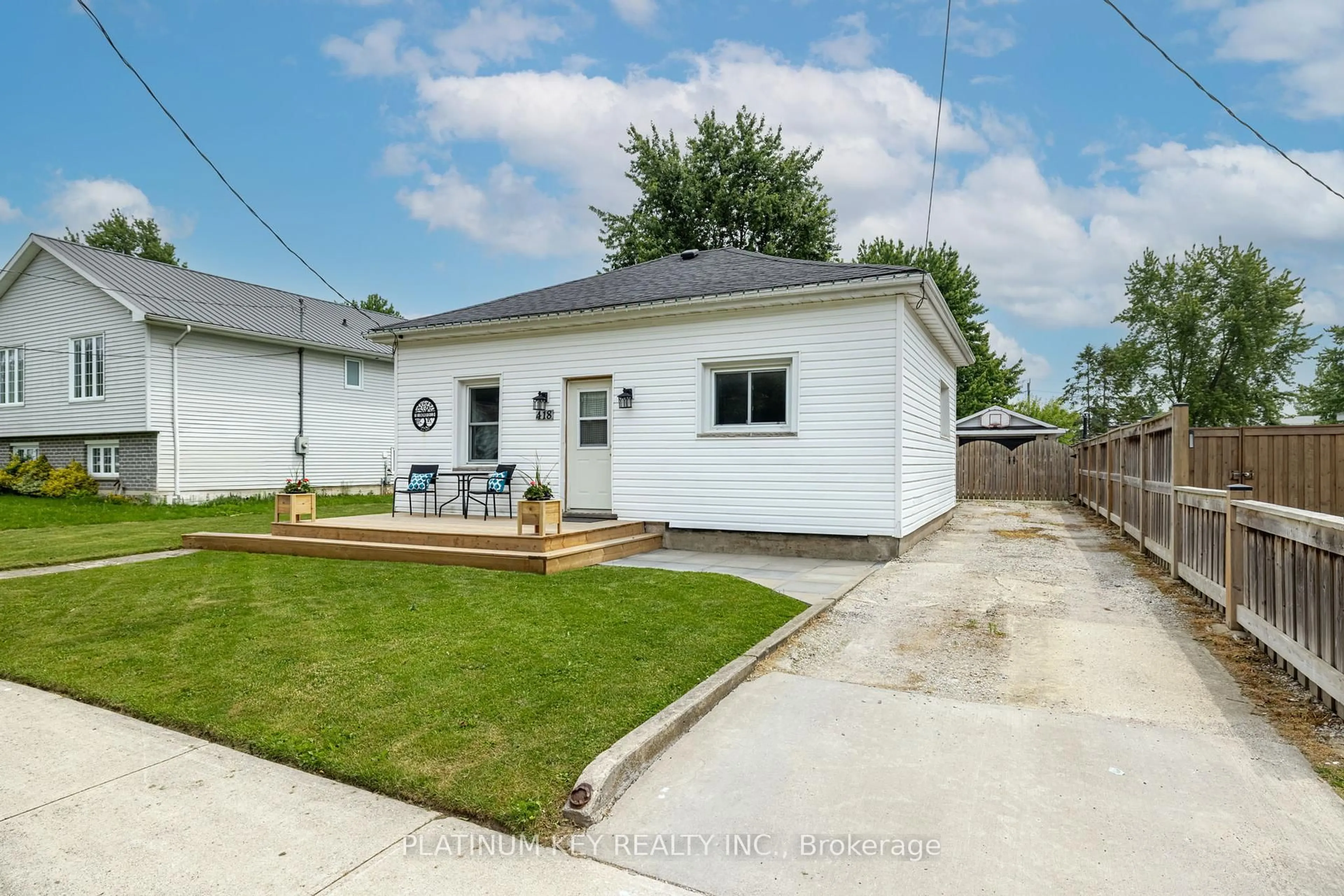 A pic from outside/outdoor area/front of a property/back of a property/a pic from drone, street for 418 Huron St, Warwick Ontario N0M 2S0