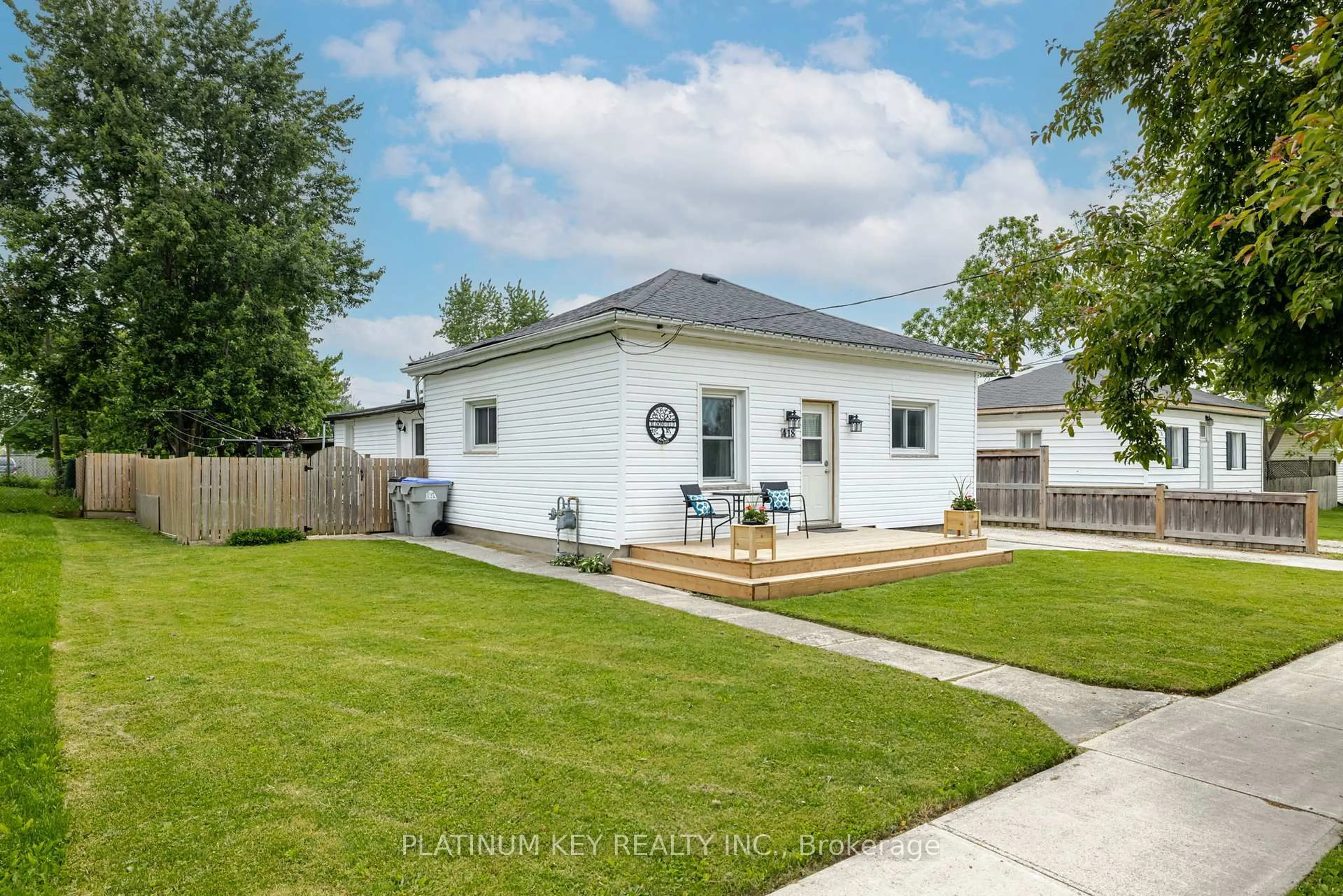 A pic from outside/outdoor area/front of a property/back of a property/a pic from drone, street for 418 Huron St, Warwick Ontario N0M 2S0