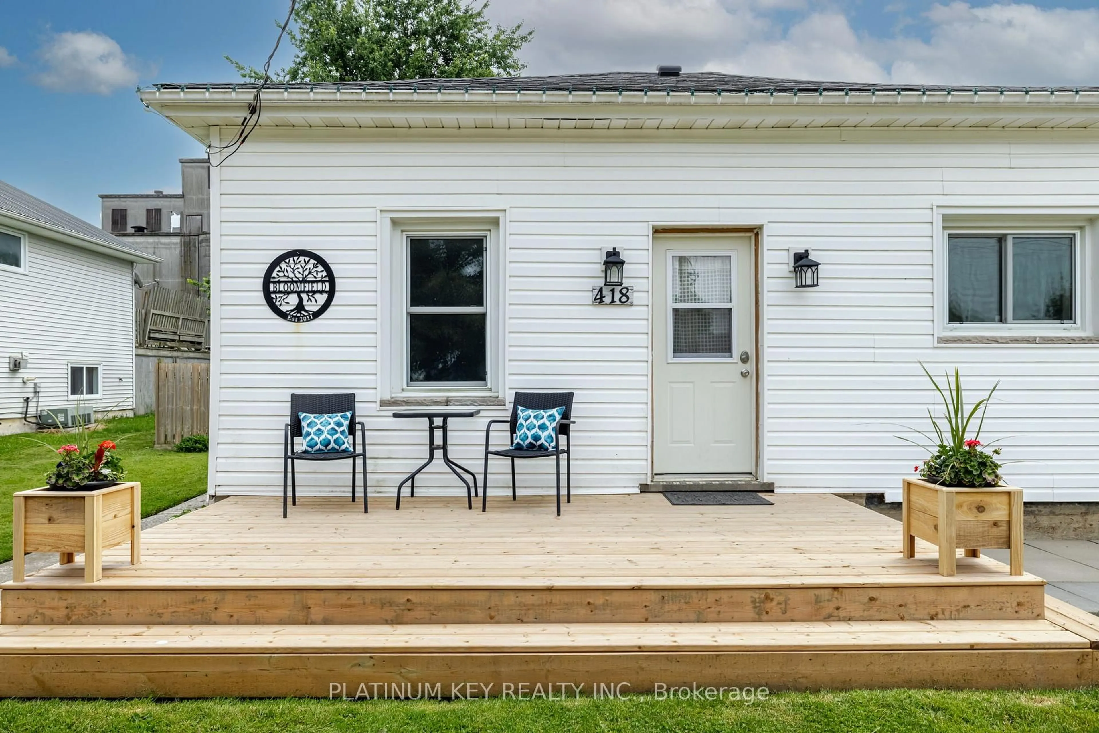 Home with vinyl exterior material, street for 418 Huron St, Warwick Ontario N0M 2S0