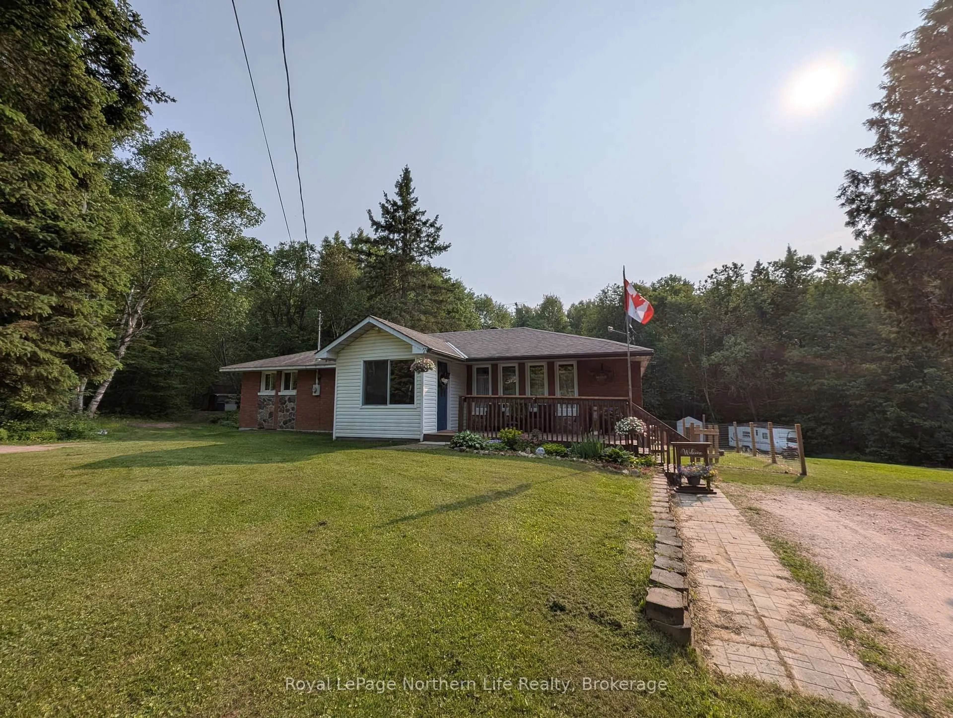A pic from outside/outdoor area/front of a property/back of a property/a pic from drone, unknown for 1967 River Rd, Chisholm Ontario P0H 1B0