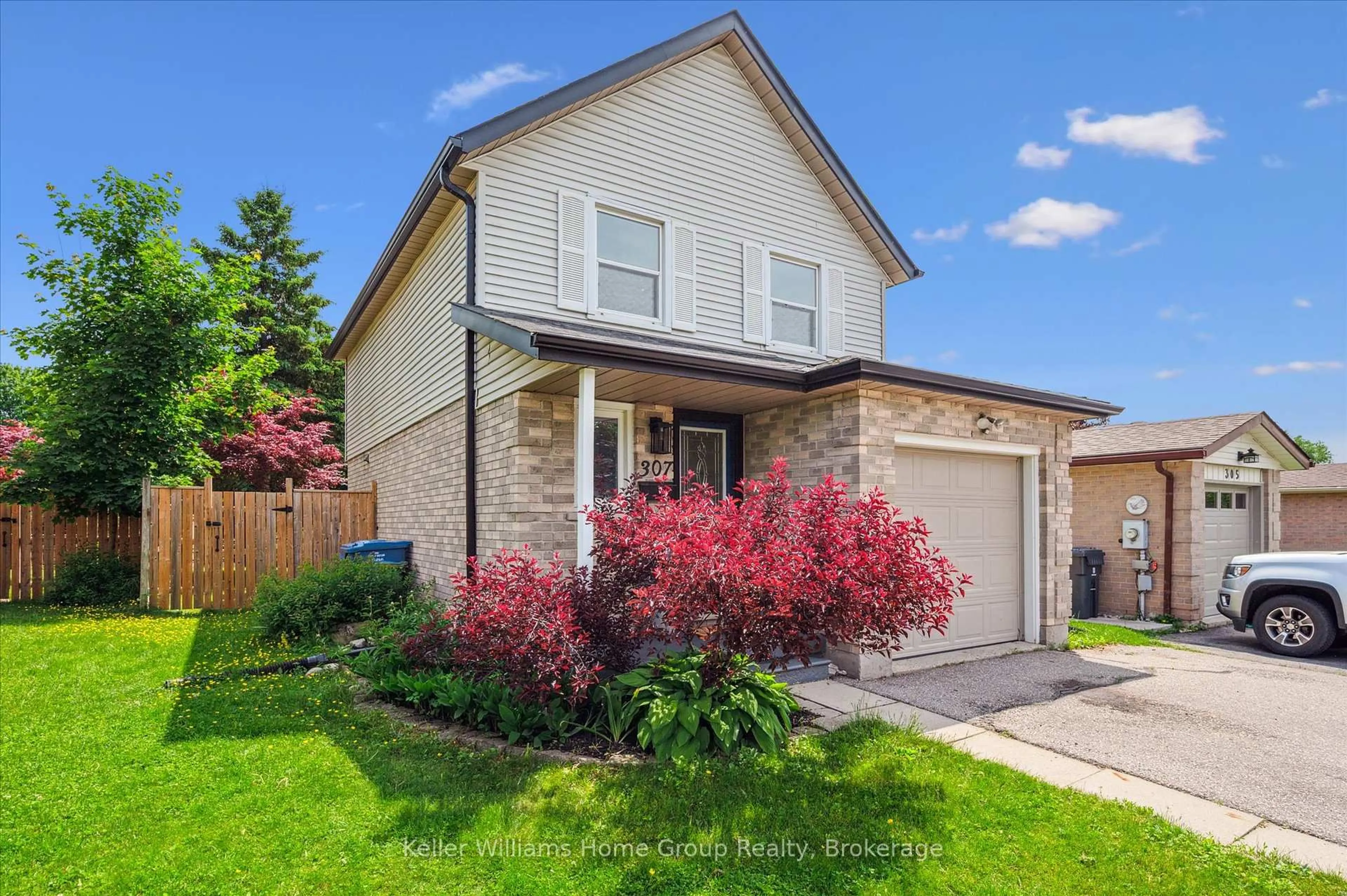 Home with brick exterior material, street for 307 Auden Rd, Guelph Ontario N1E 6S4