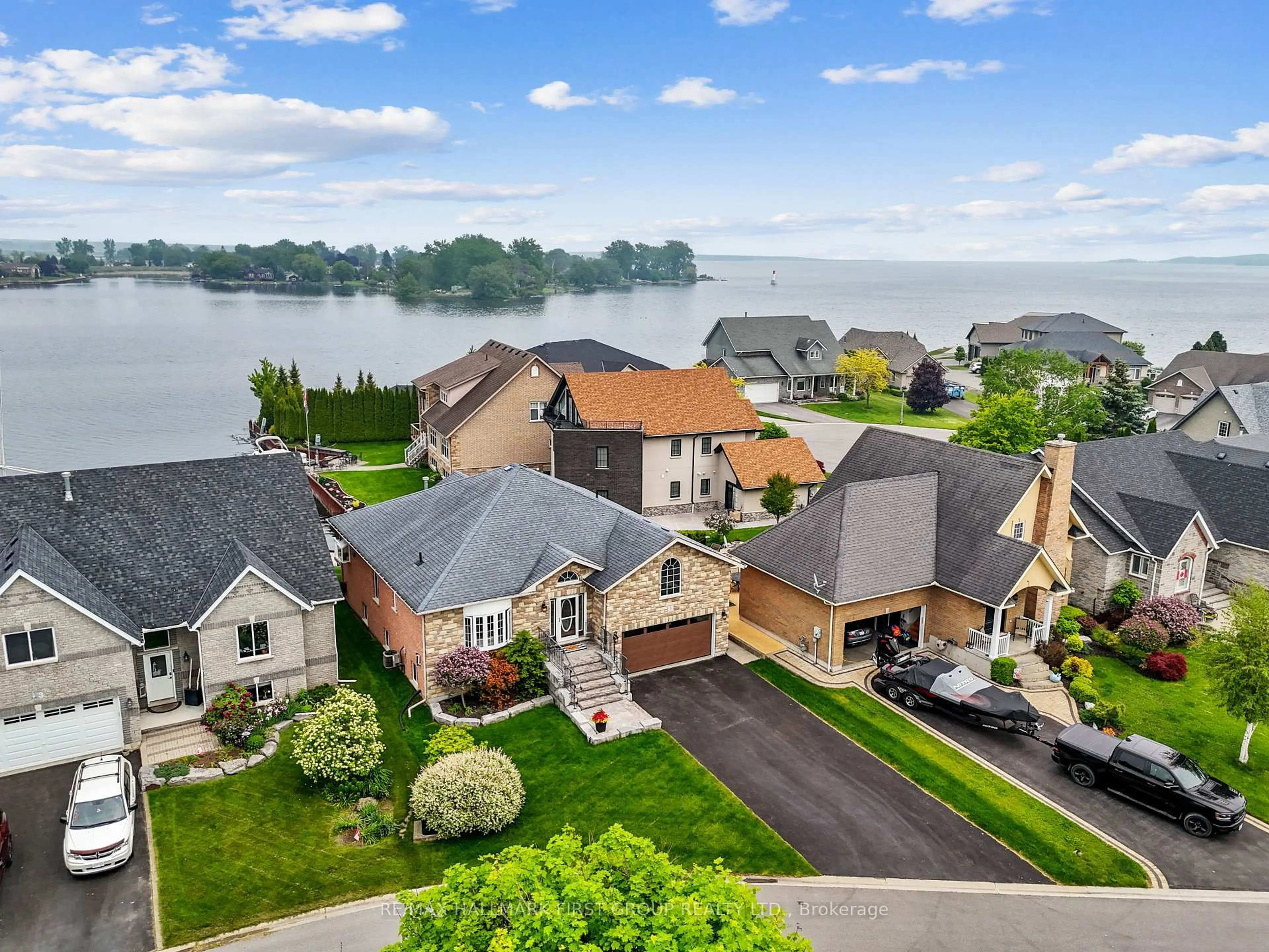 A pic from outside/outdoor area/front of a property/back of a property/a pic from drone, water/lake/river/ocean view for 5 Edgewater Dr, Brighton Ontario K0K 1H0
