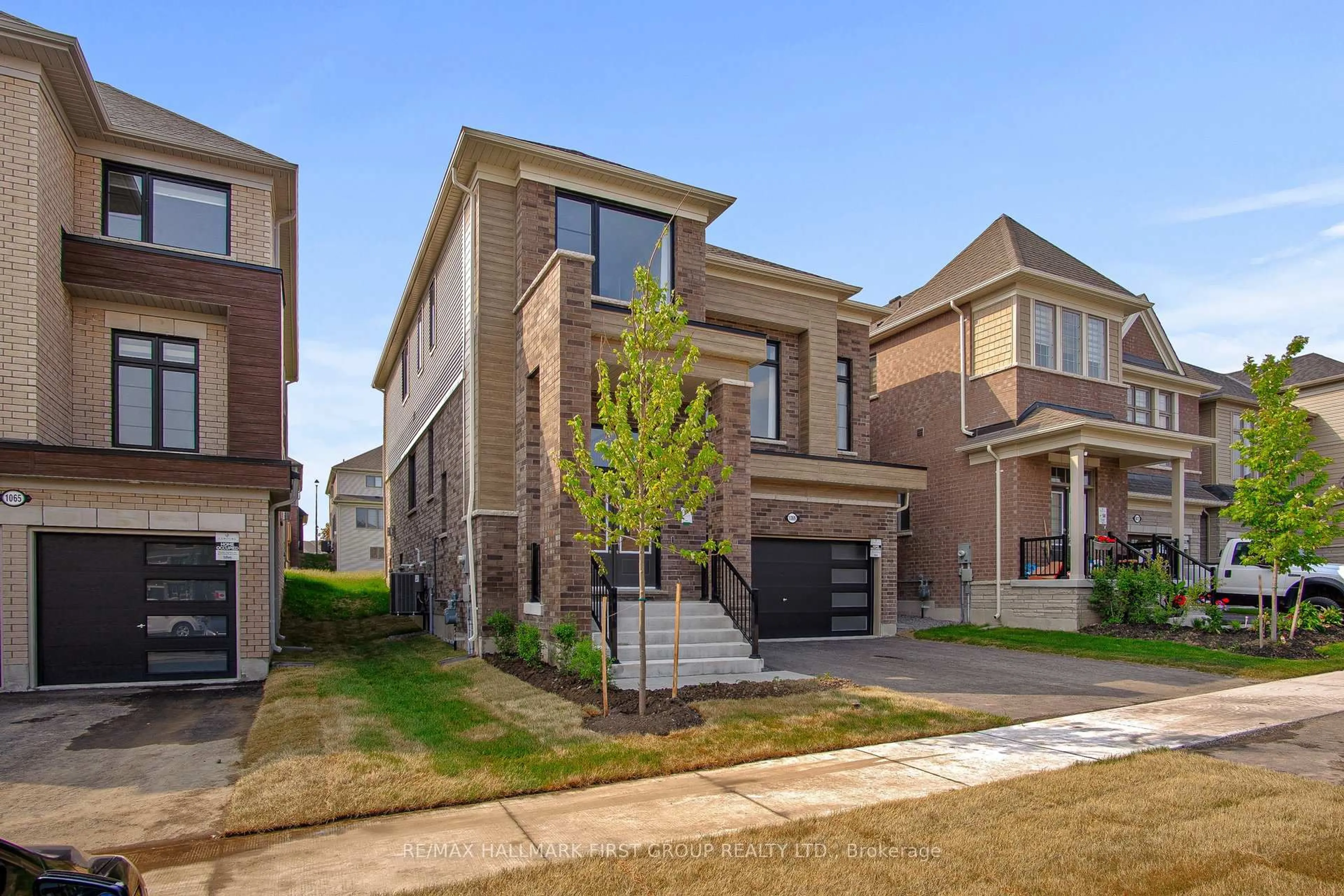 Home with brick exterior material, street for 1069 Trailsview Ave, Cobourg Ontario K9A 4J5