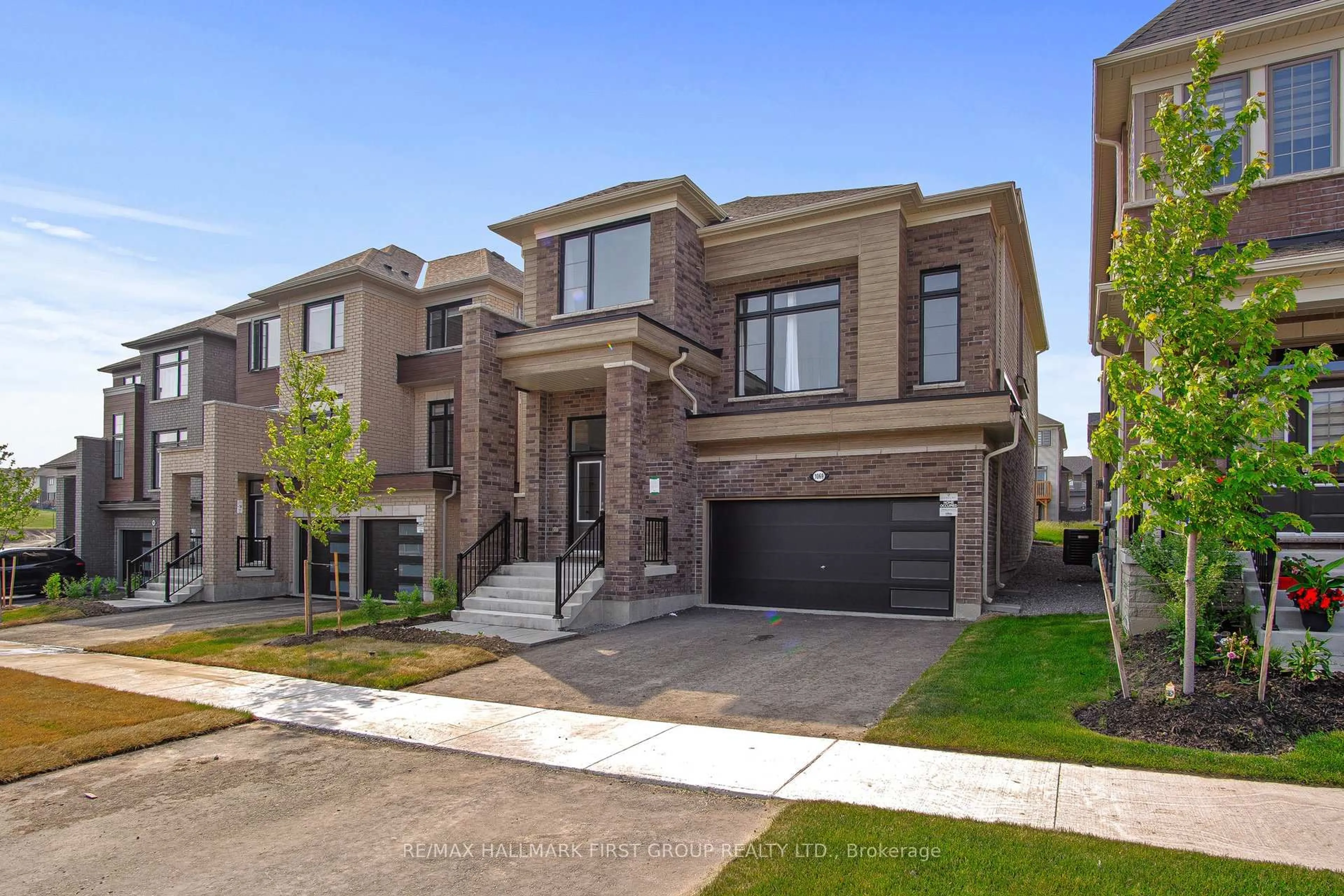 Home with brick exterior material, street for 1069 Trailsview Ave, Cobourg Ontario K9A 4J5