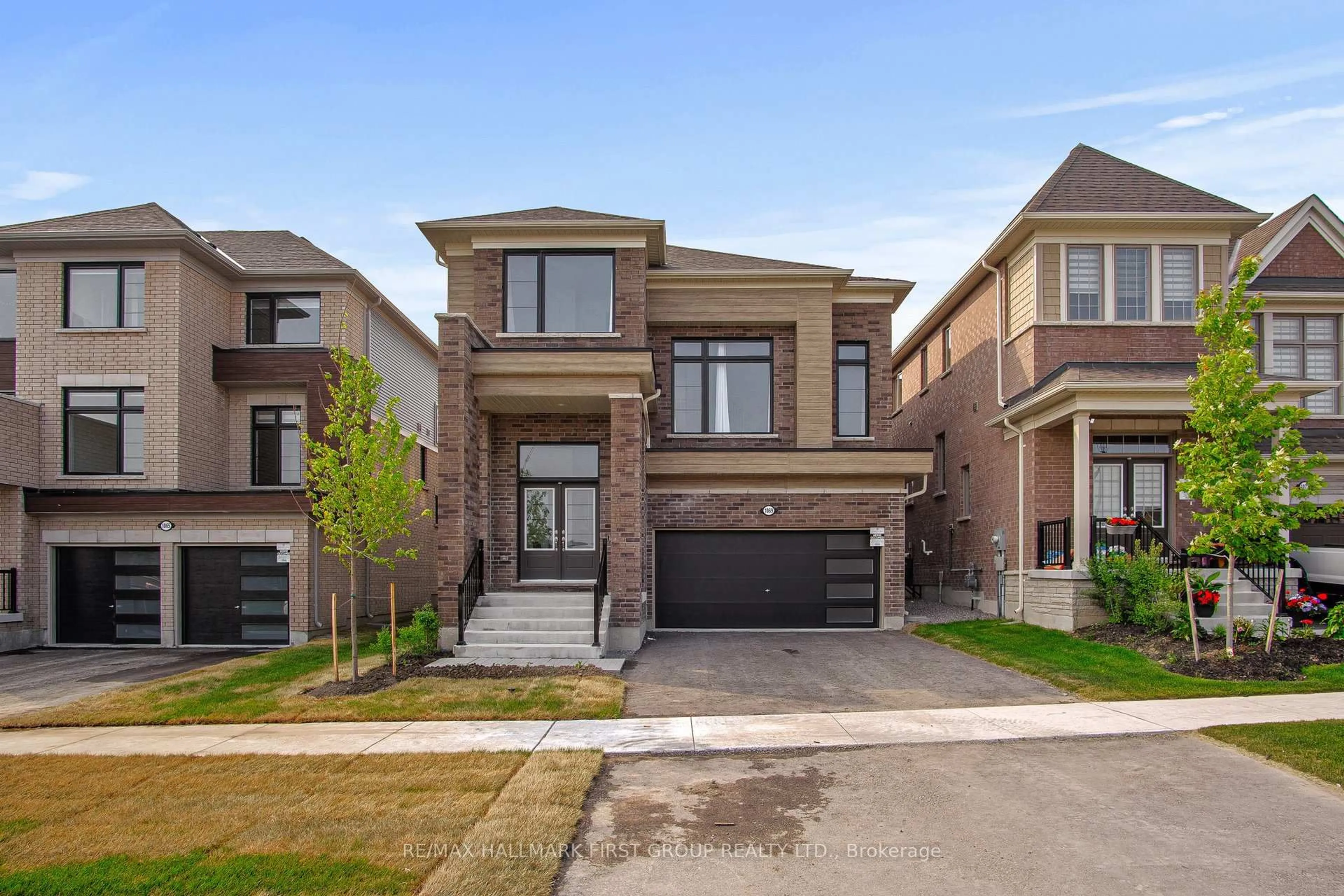Home with brick exterior material, street for 1069 Trailsview Ave, Cobourg Ontario K9A 4J5