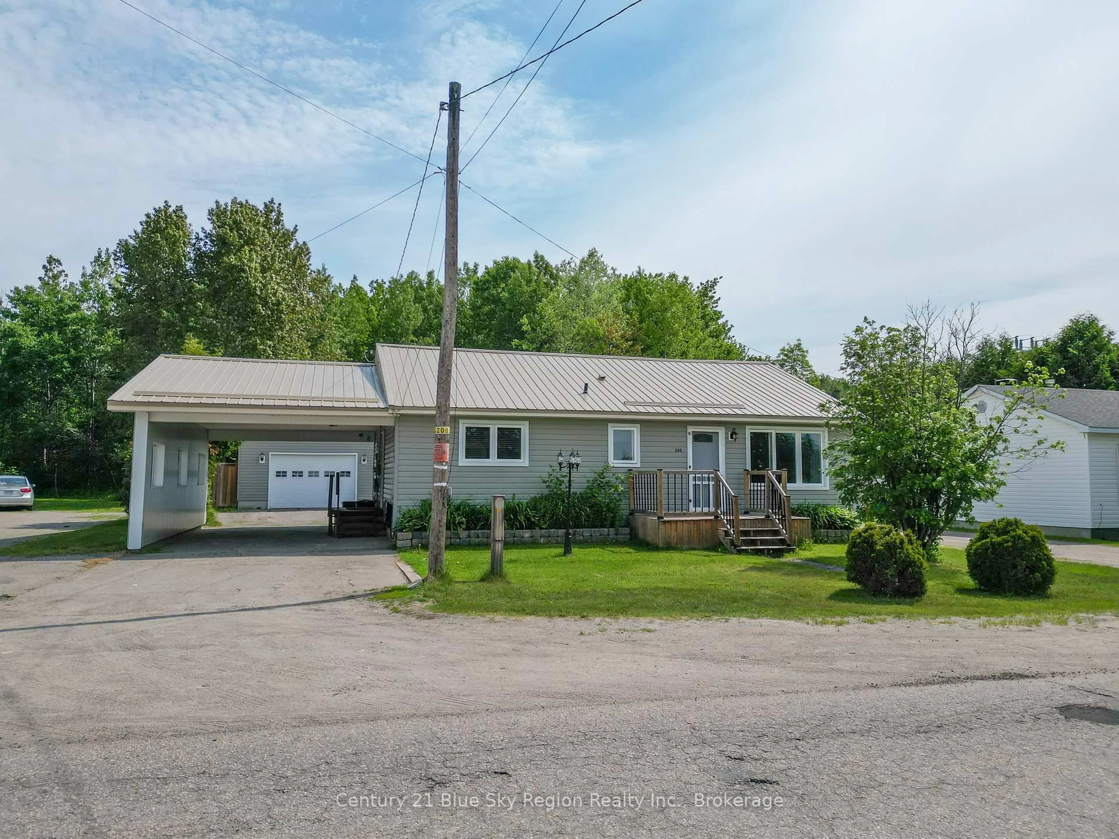 A pic from outside/outdoor area/front of a property/back of a property/a pic from drone, street for 240 Cache Bay Rd, West Nipissing Ontario P2B 3H7