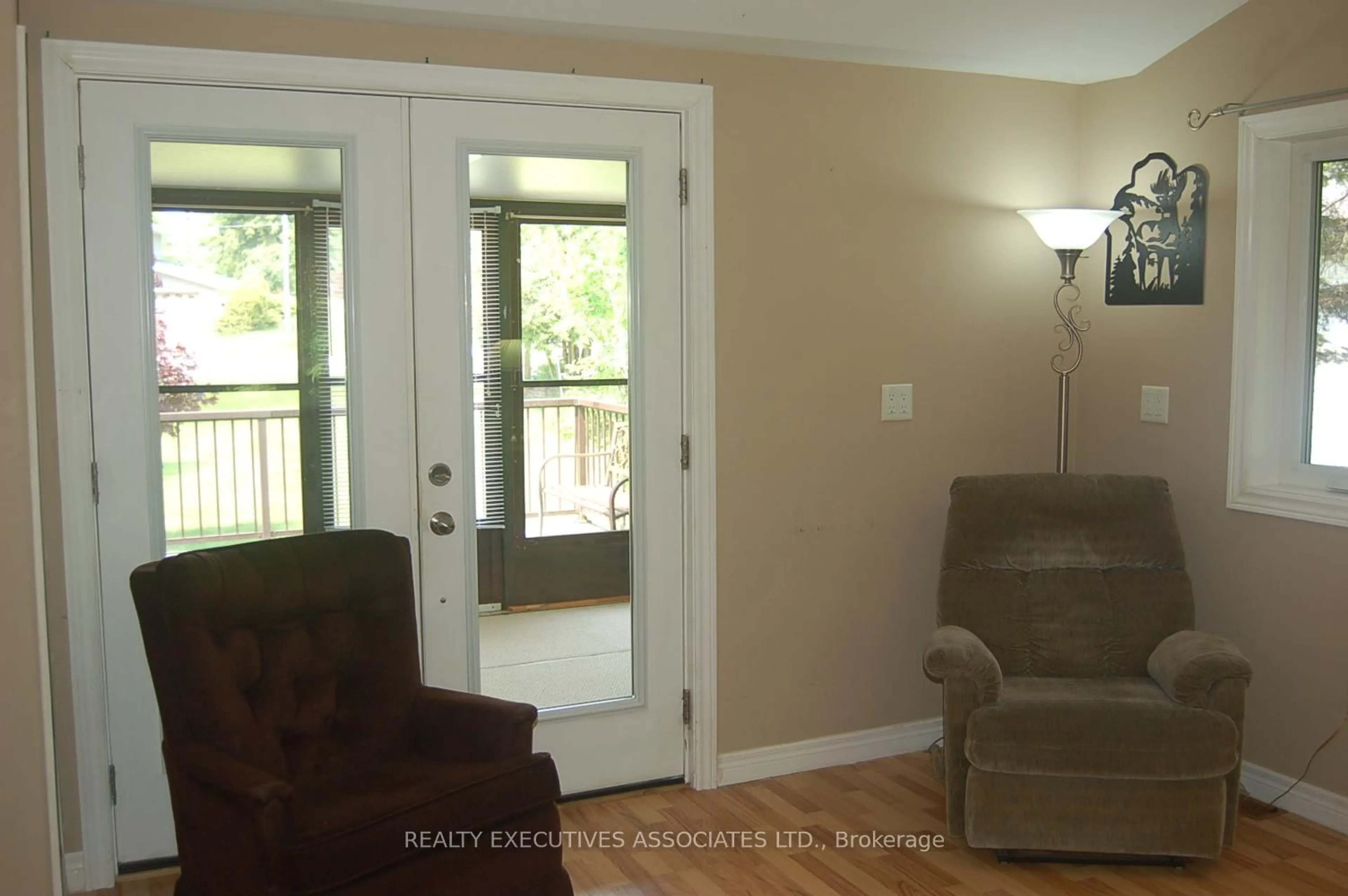 Living room with furniture, wood/laminate floor for 211 Alpine Lake Rd, Trent Lakes Ontario K0M 1A0