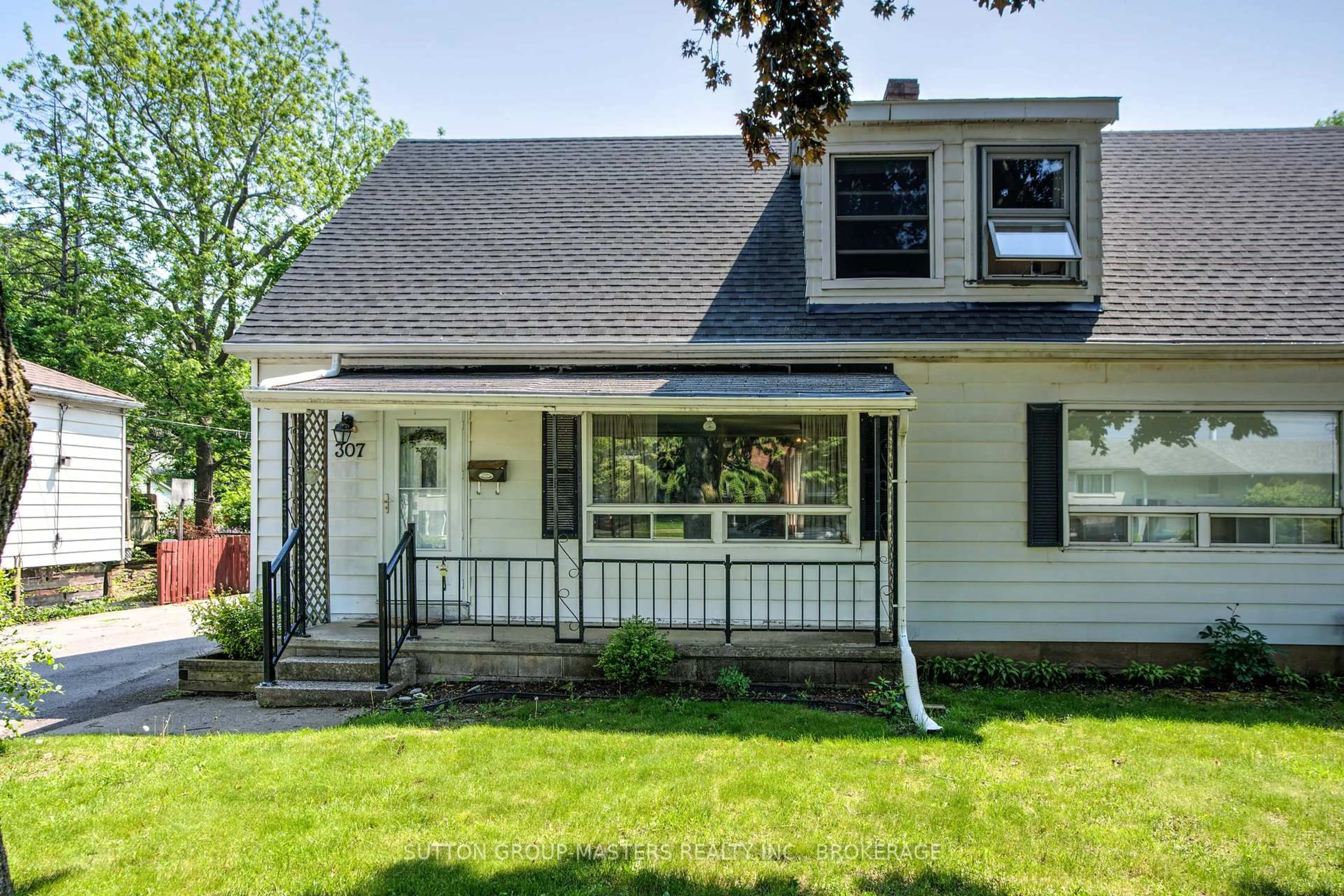 Home with vinyl exterior material, street for 307 Palace Rd, Kingston Ontario K7L 4T4