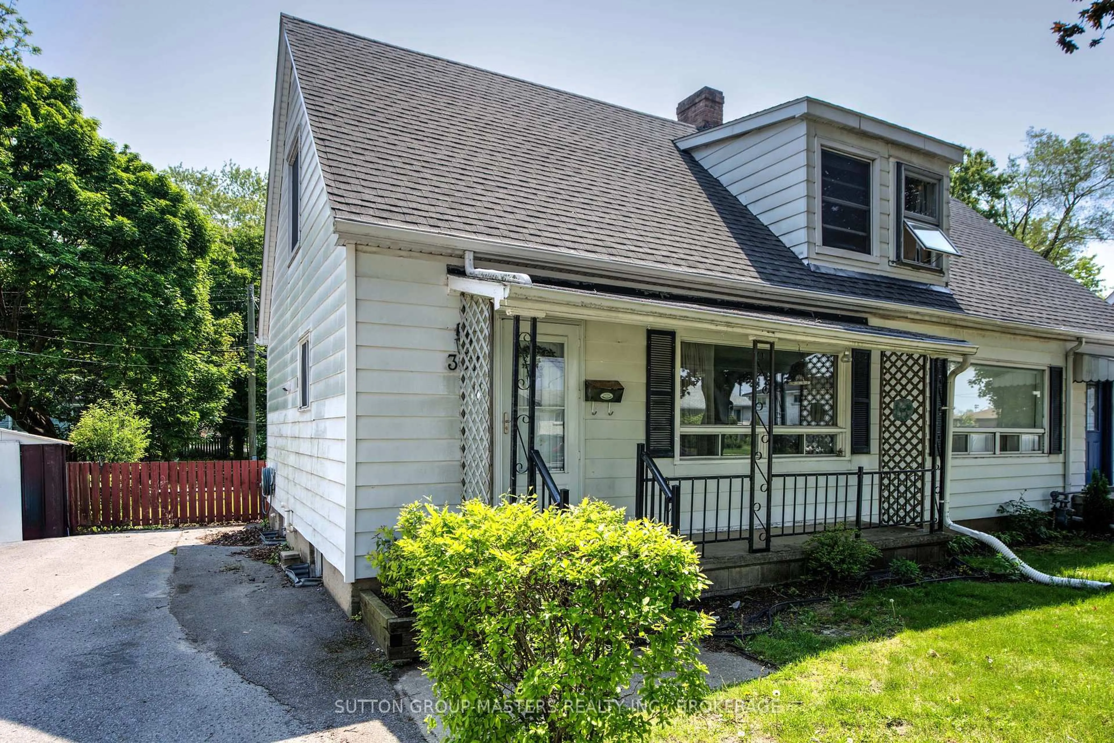 Home with vinyl exterior material, street for 307 Palace Rd, Kingston Ontario K7L 4T4