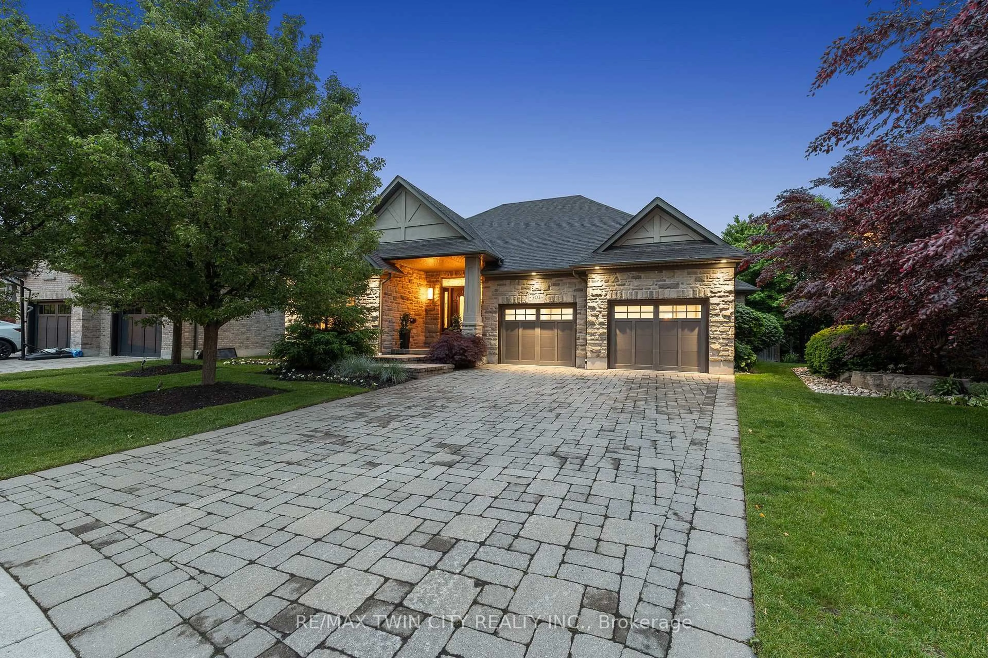 Home with brick exterior material, street for 303 Terrace Wood Cres, Kitchener Ontario N2P 0A8