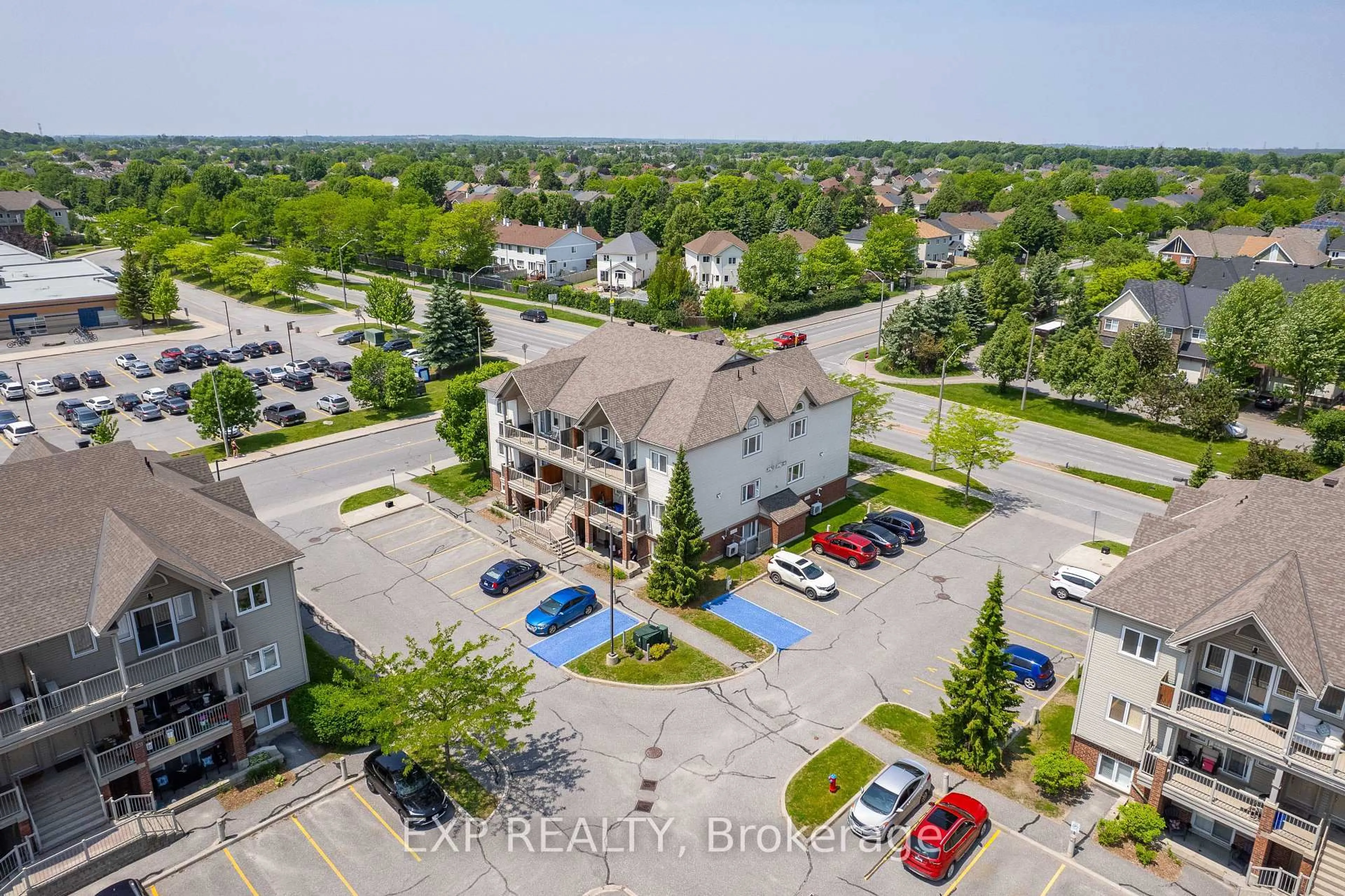 A pic from outside/outdoor area/front of a property/back of a property/a pic from drone, unknown for 221 Crestway Dr #D, Ottawa Ontario K2G 0A9