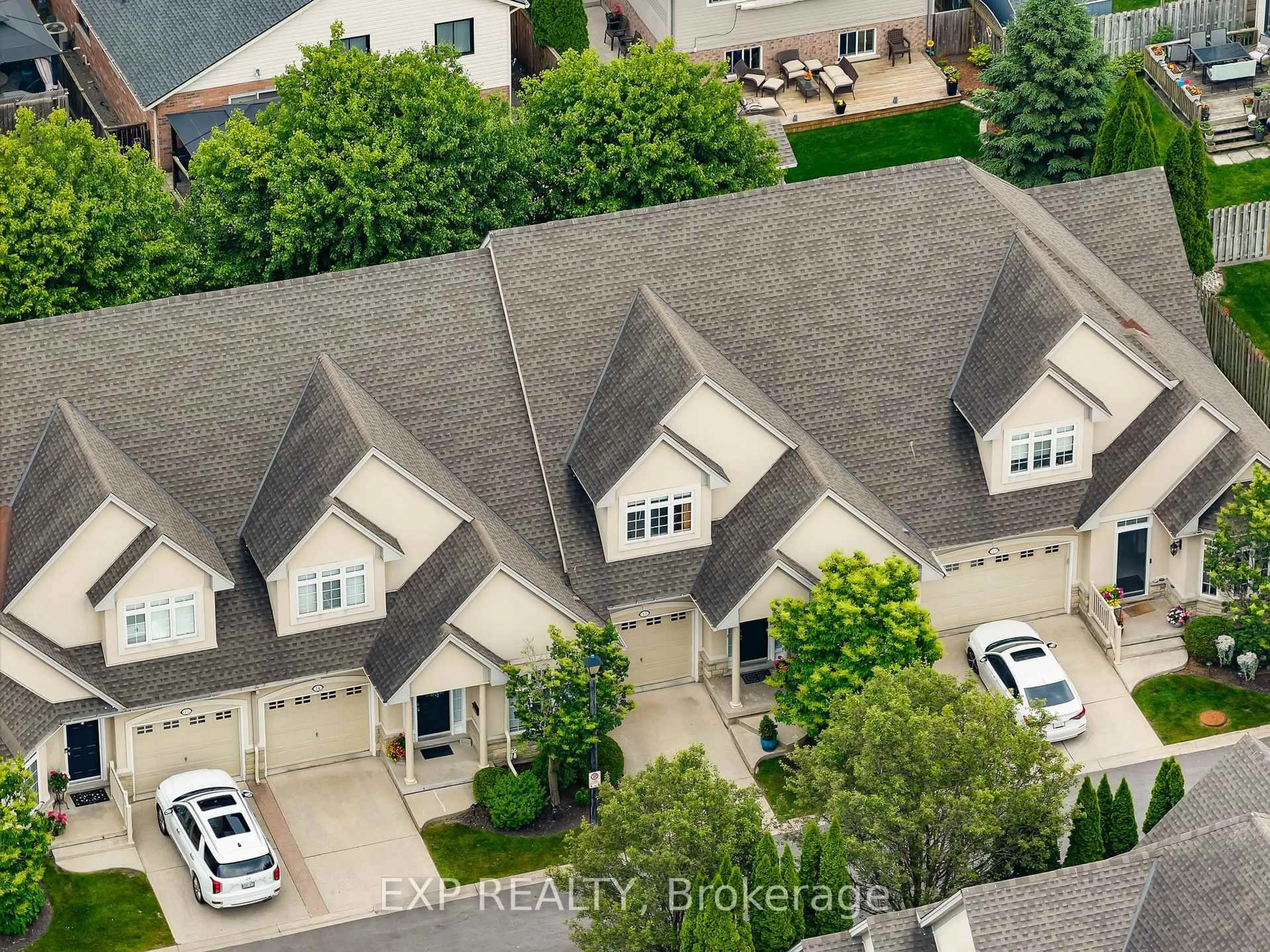 A pic from outside/outdoor area/front of a property/back of a property/a pic from drone, street for 8142 Costabile Dr #13, Niagara Falls Ontario L2H 3M3