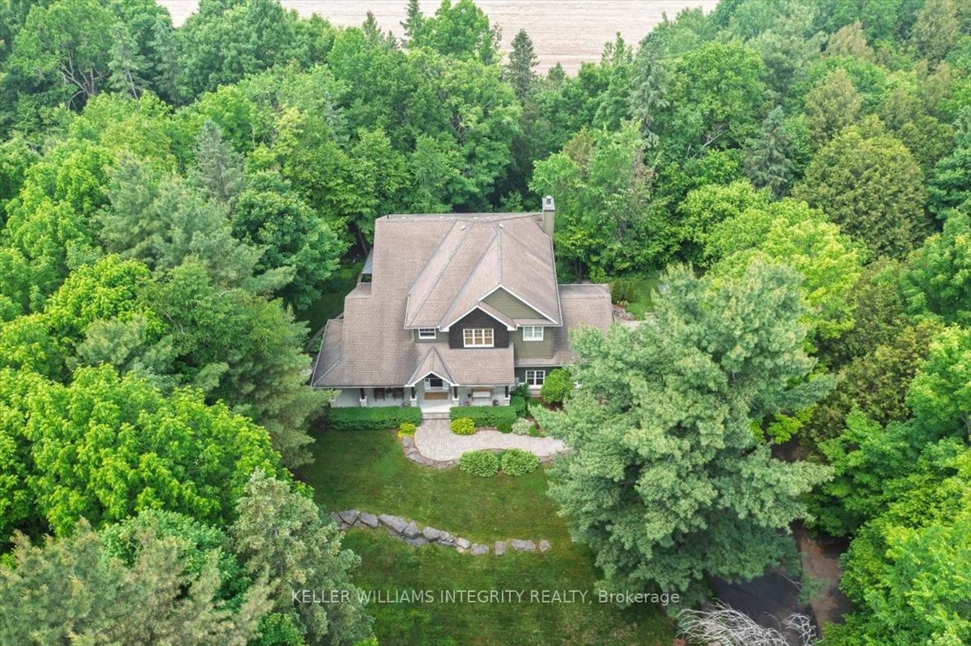 A pic from outside/outdoor area/front of a property/back of a property/a pic from drone, water/lake/river/ocean view for 2390 Brennan Park Dr, Ottawa Ontario K4C 1H6