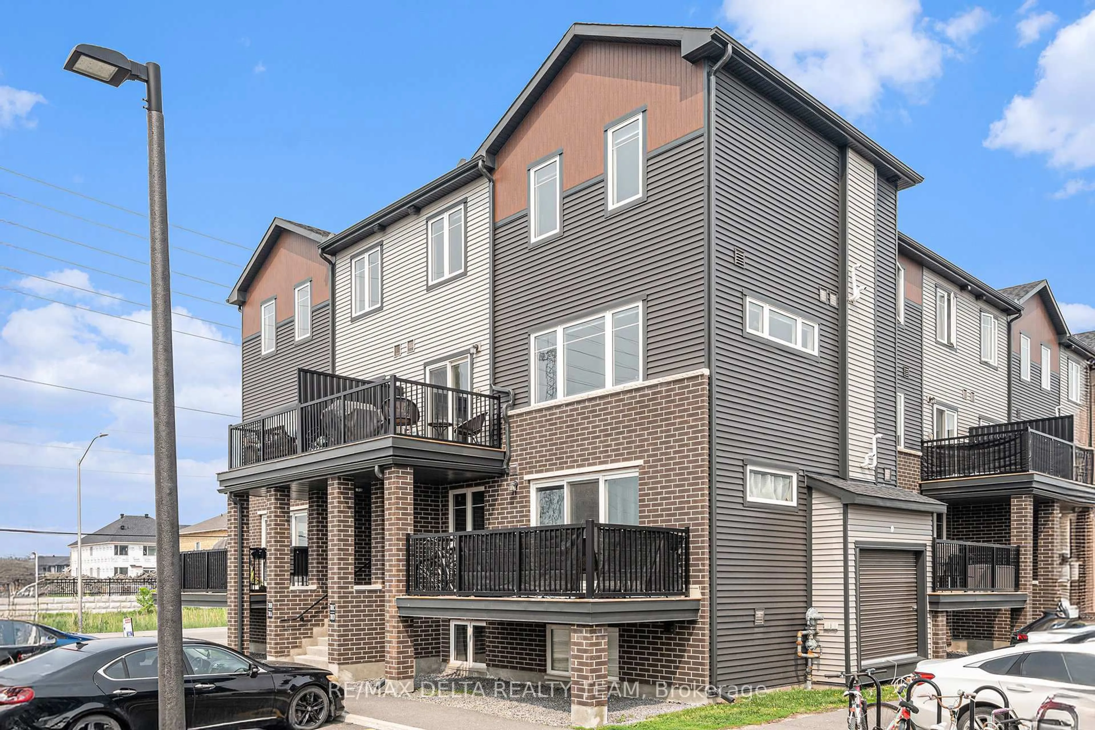 Home with brick exterior material, street for 701 Amberwing Private #C, Ottawa Ontario K4A 5H5