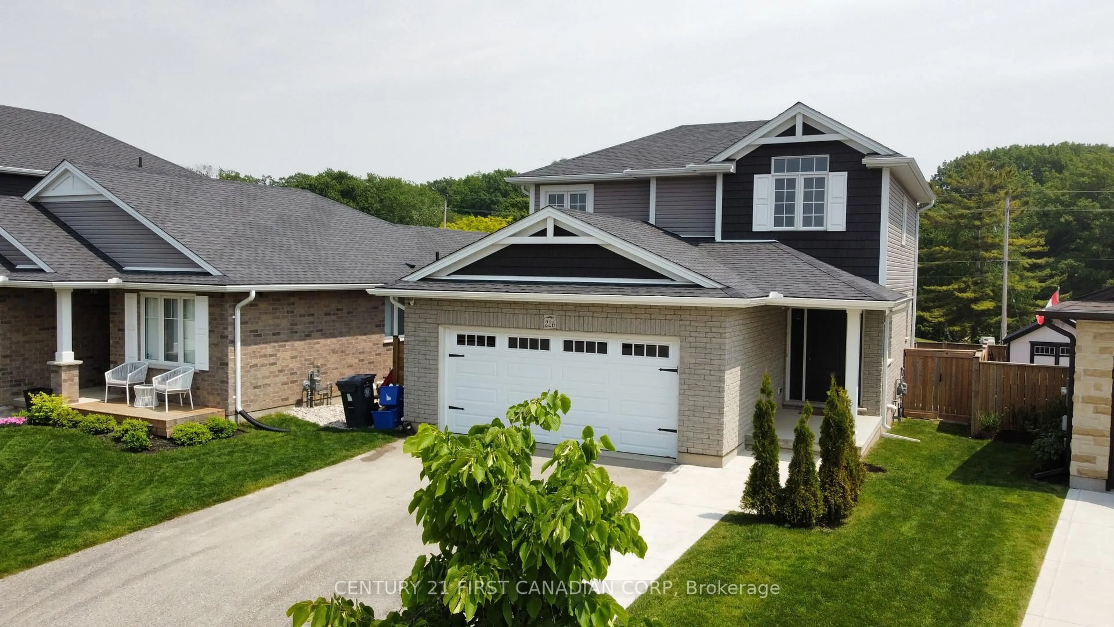 Home with vinyl exterior material, street for 226 Emery St, Central Elgin Ontario N5L 0A5